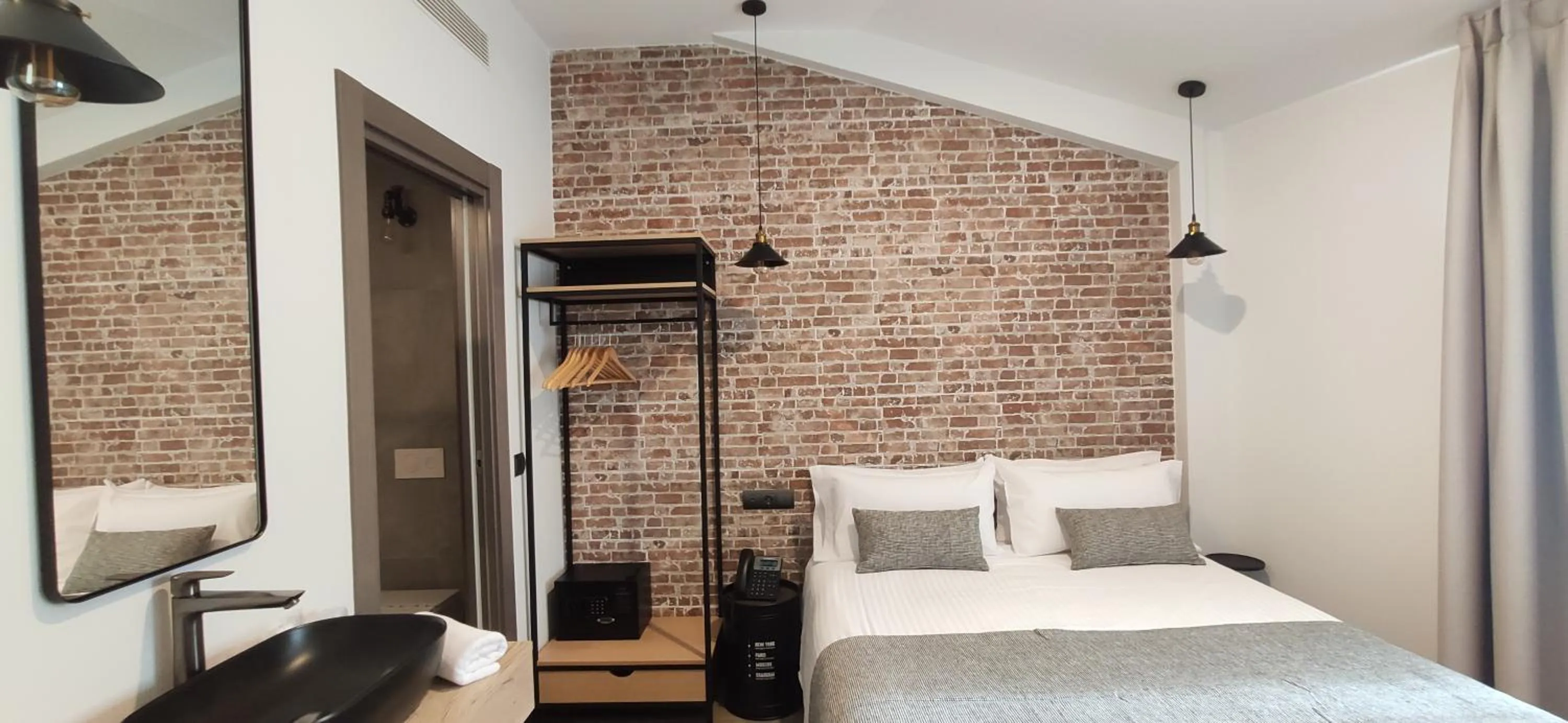 Bed in Le Petit Boutique Hotel