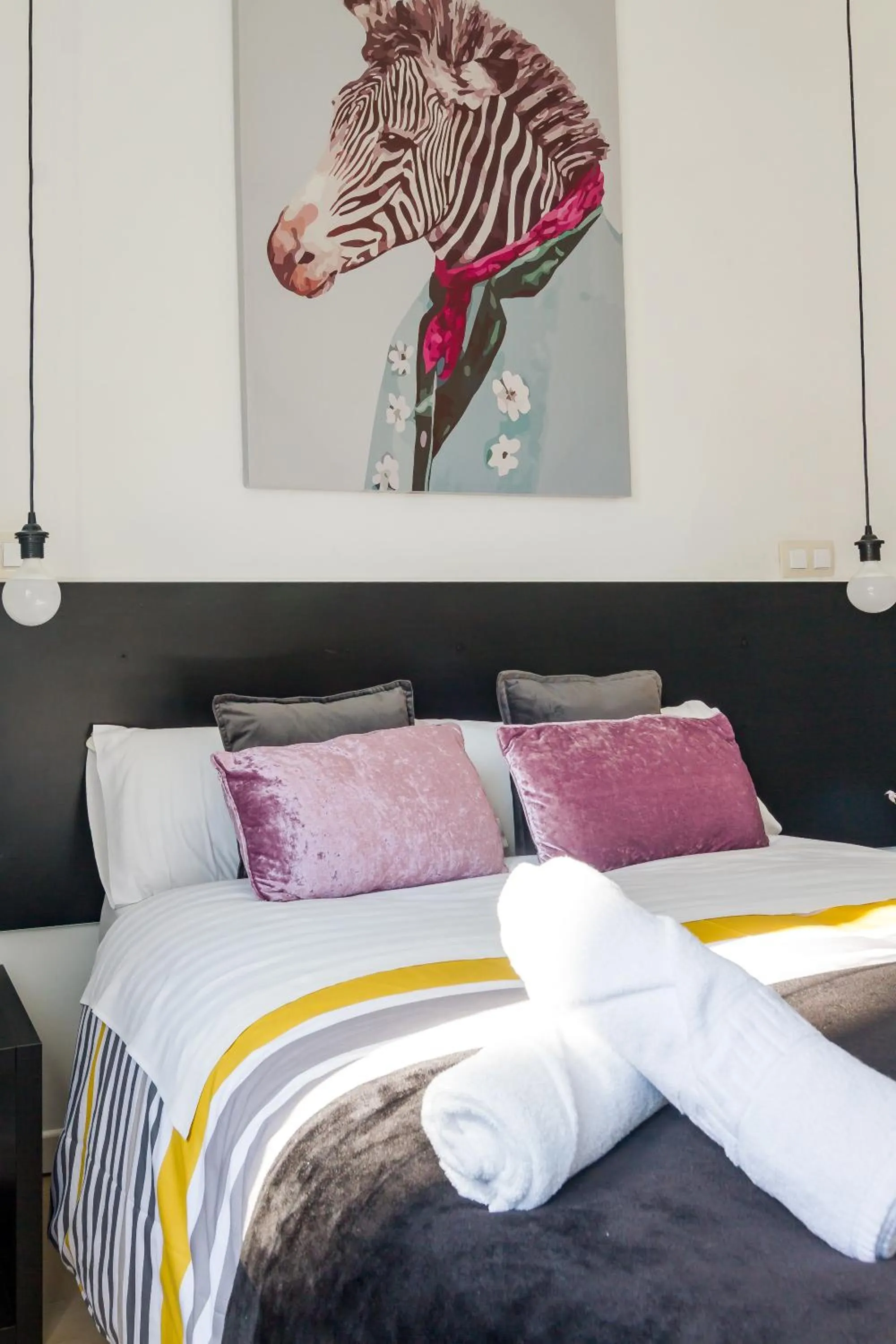 Bed in AYZ Javier Cabrini - Auto check-in property