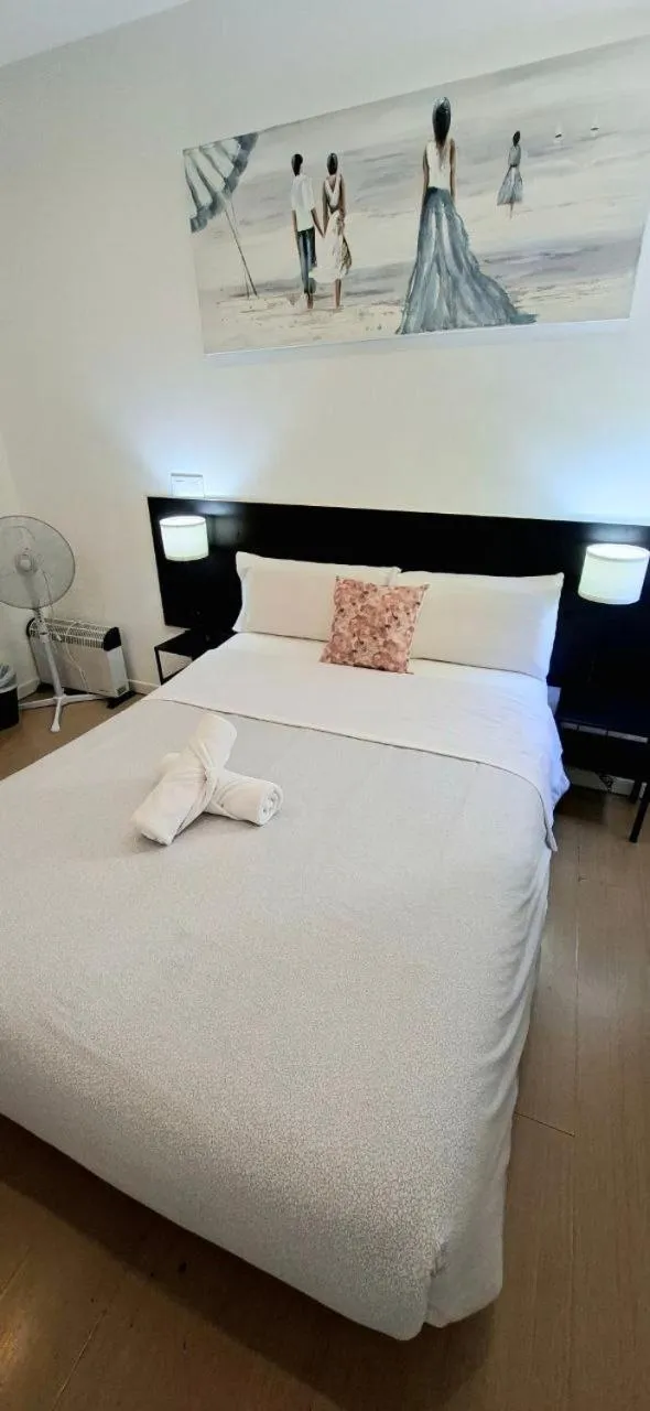 Bed in AYZ Javier Cabrini - Auto check-in property