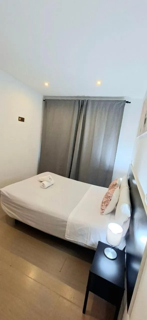 Bed in AYZ Javier Cabrini - Auto check-in property