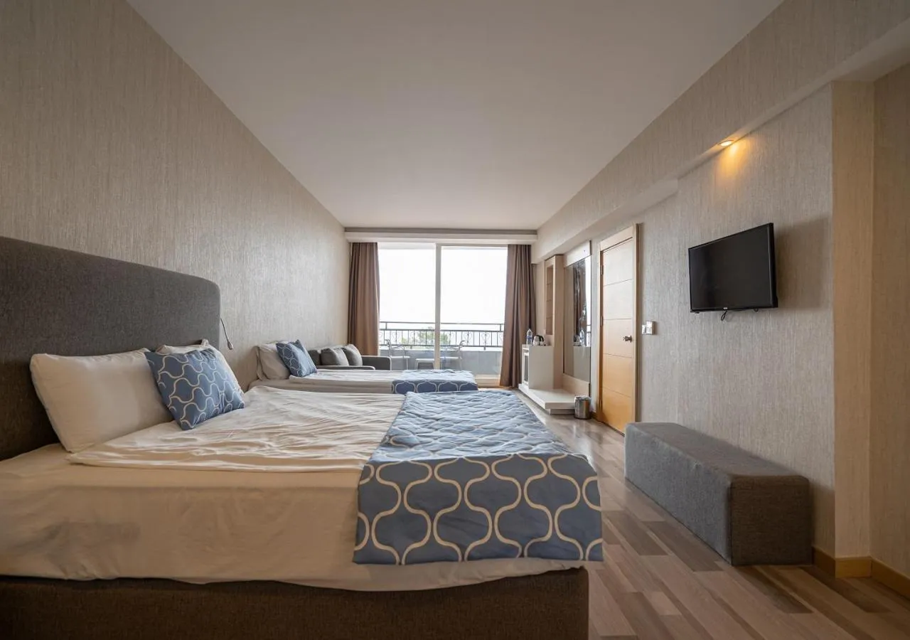 Bed in Amara Comfort Resort