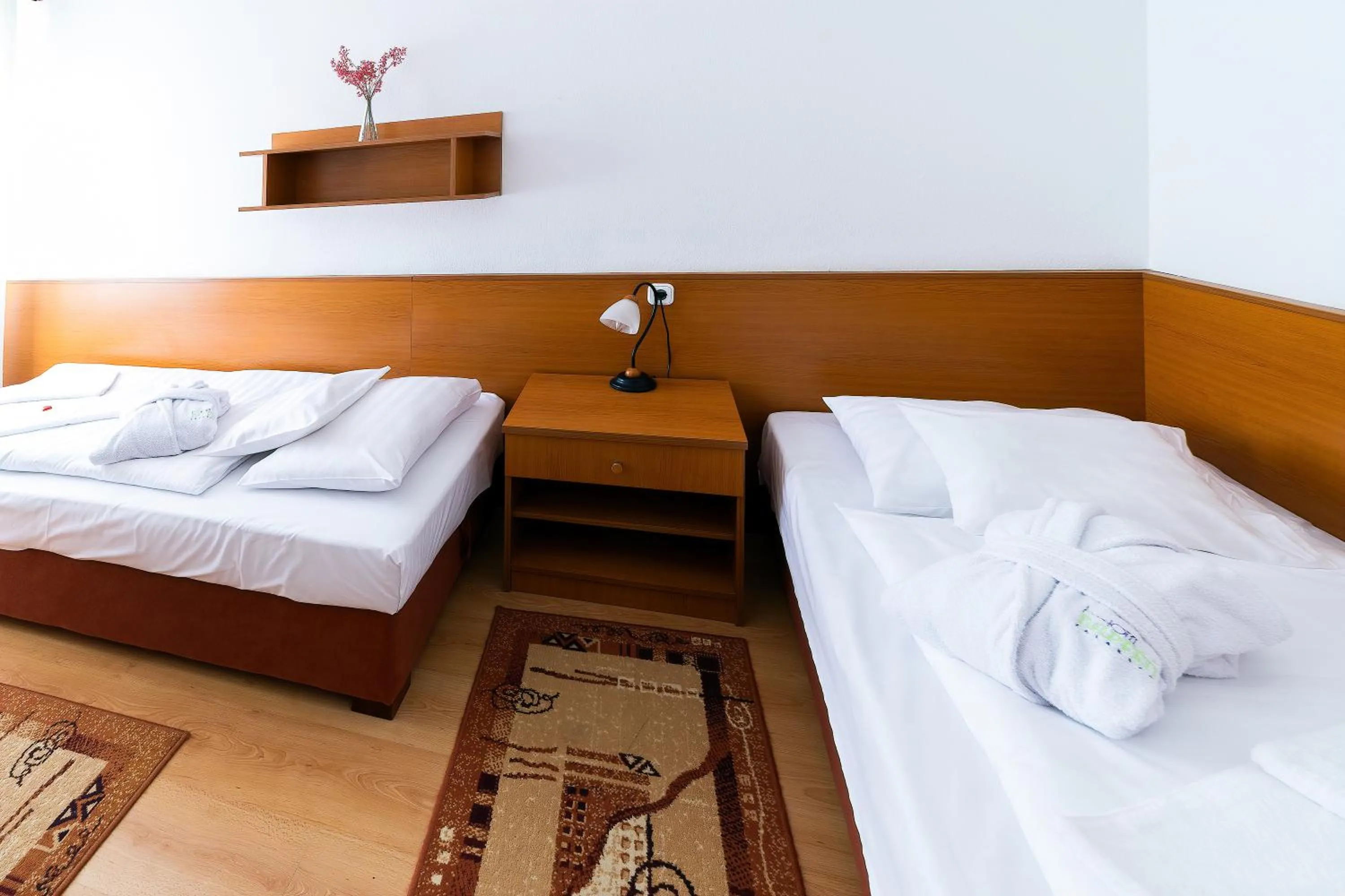 Bed in Napfény Hotel