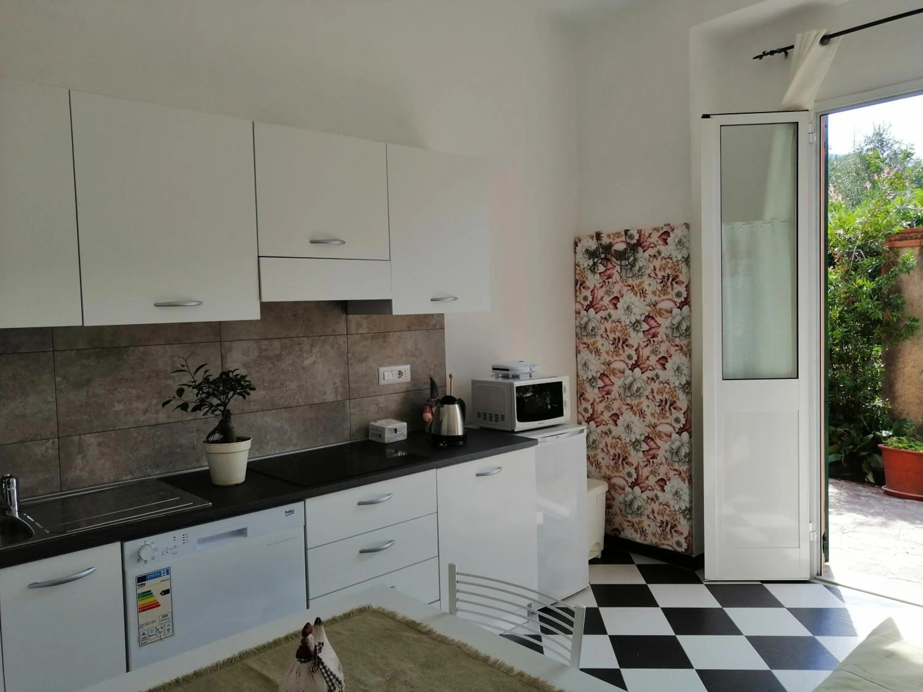 Kitchen or kitchenette in Affittacamere Mariella