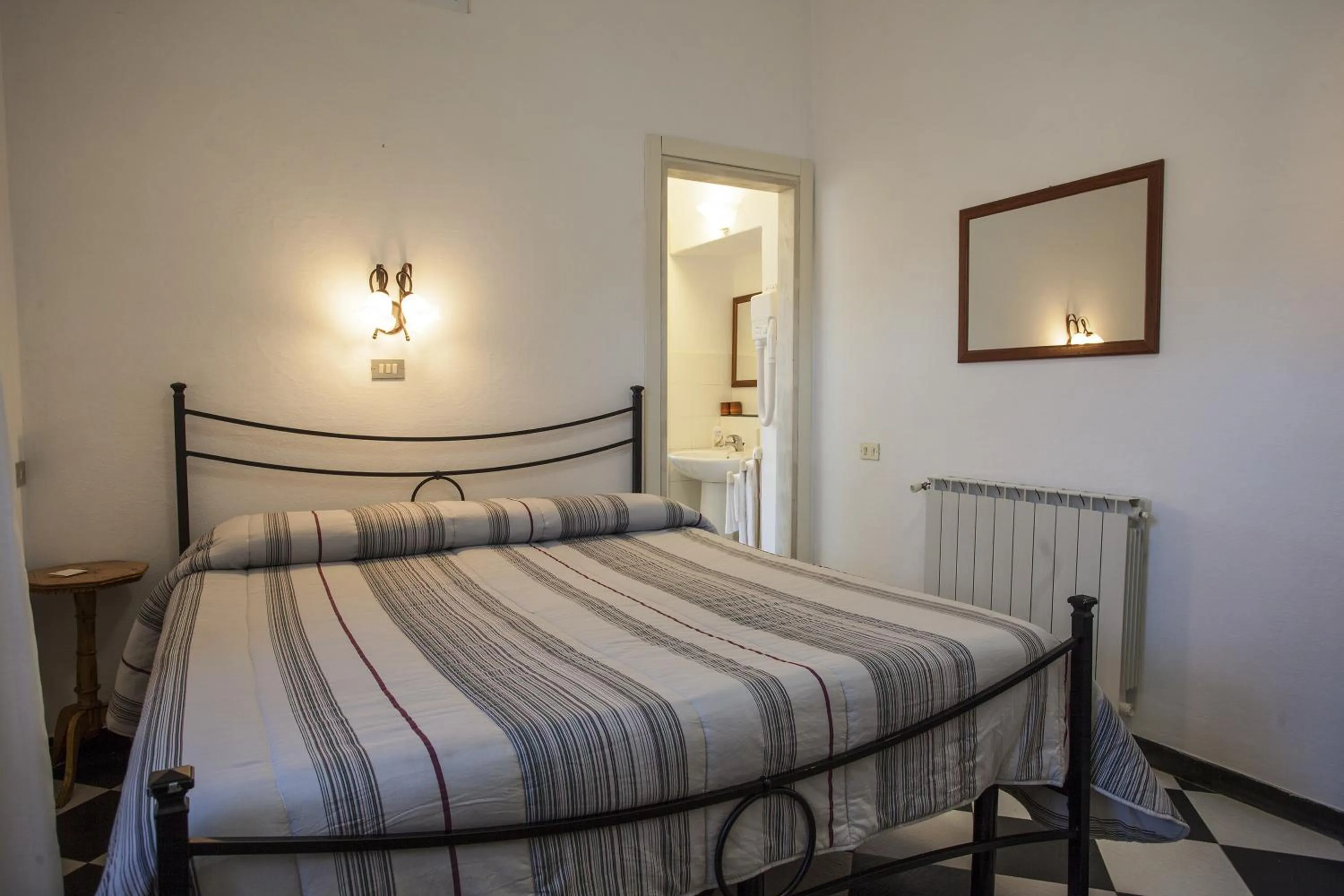 Bedroom in Affittacamere Mariella