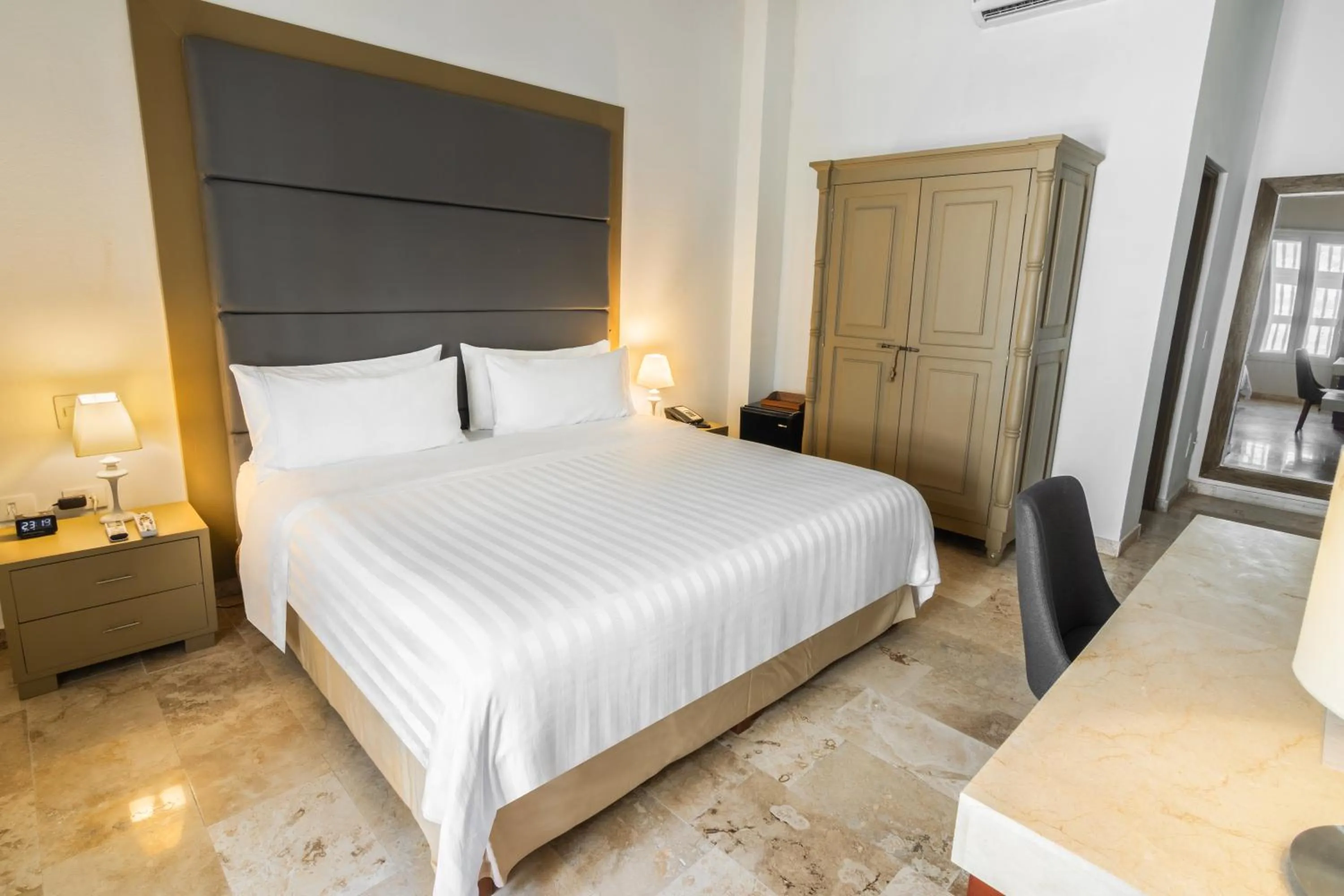 Photo of the whole room, Bed in GHL Collection Armería Real Hotel