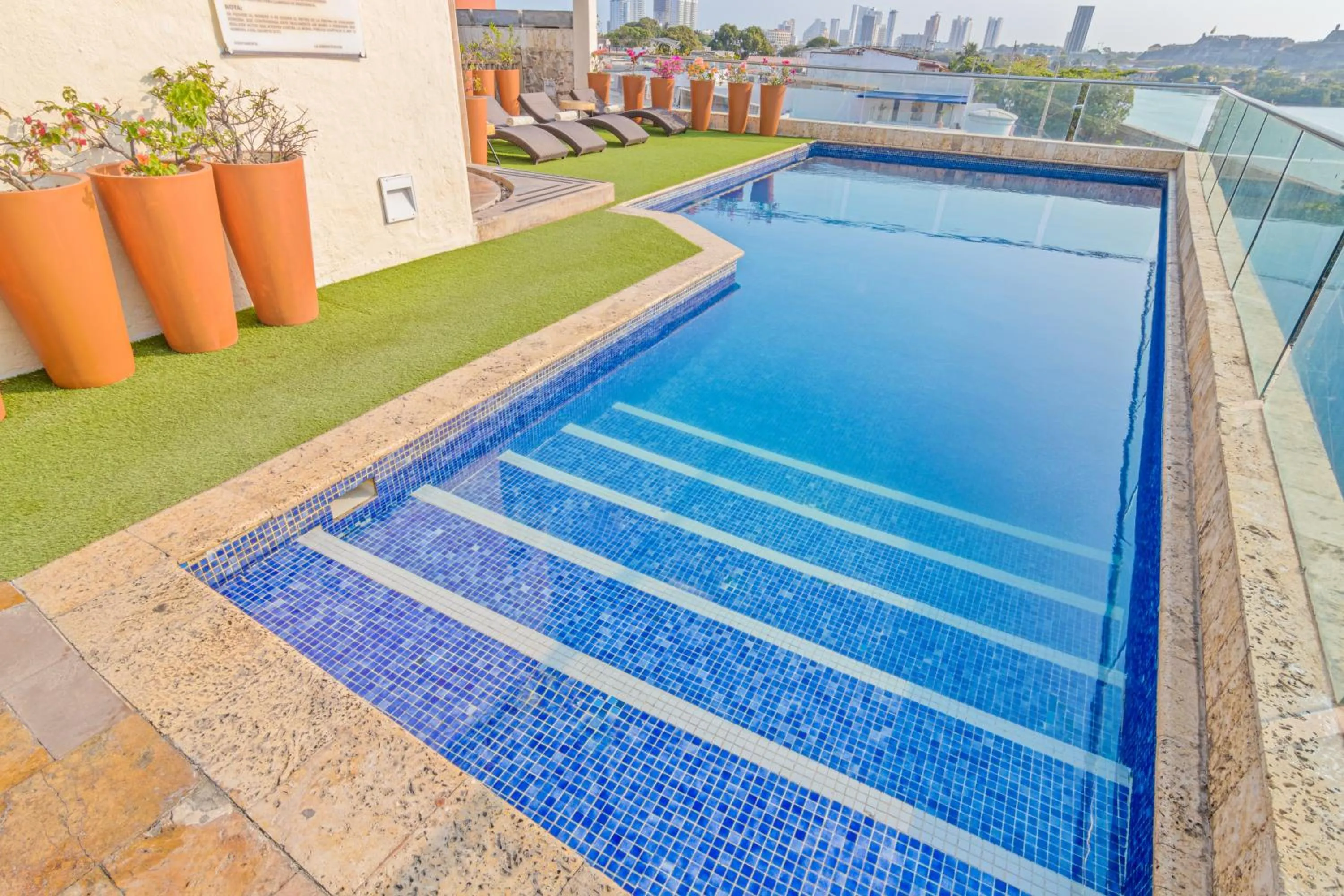 Swimming pool in GHL Collection Armería Real Hotel