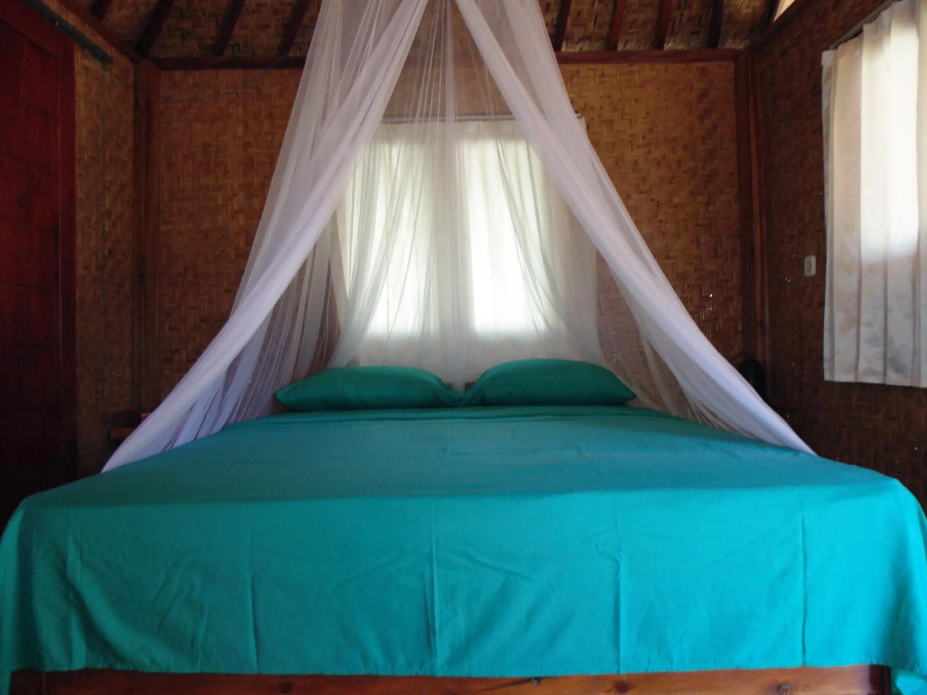 Bed in Sunset Springs Beach Retreat