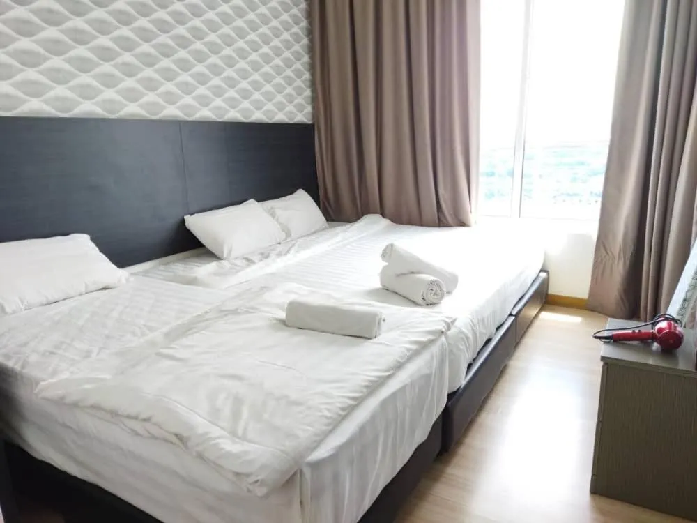 Bed in ExcluSuites Malacca @ The Wave Residence