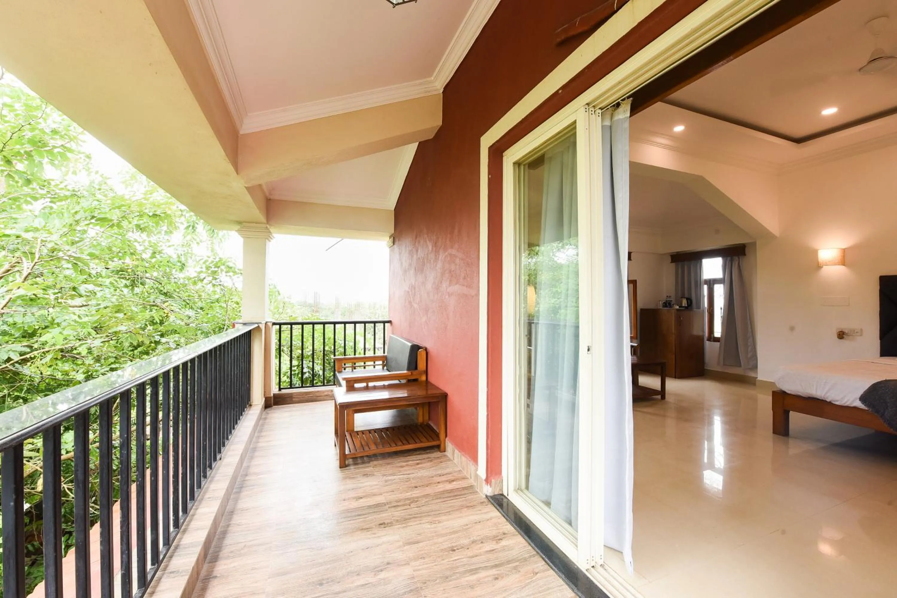 Balcony/Terrace, Bed in Raposo Resorts