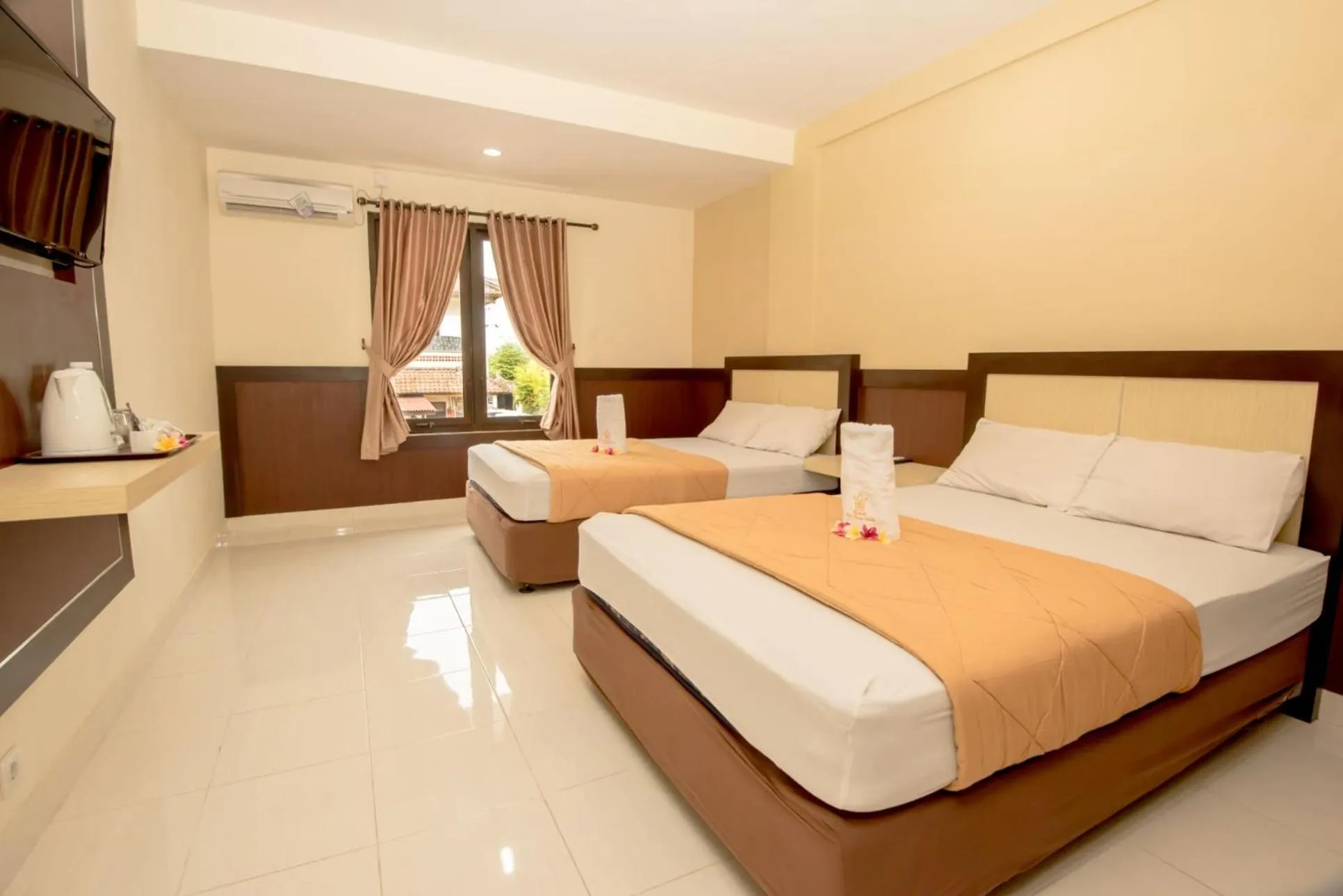 Photo of the whole room, Bed in Hotel Puri Nusa Indah
