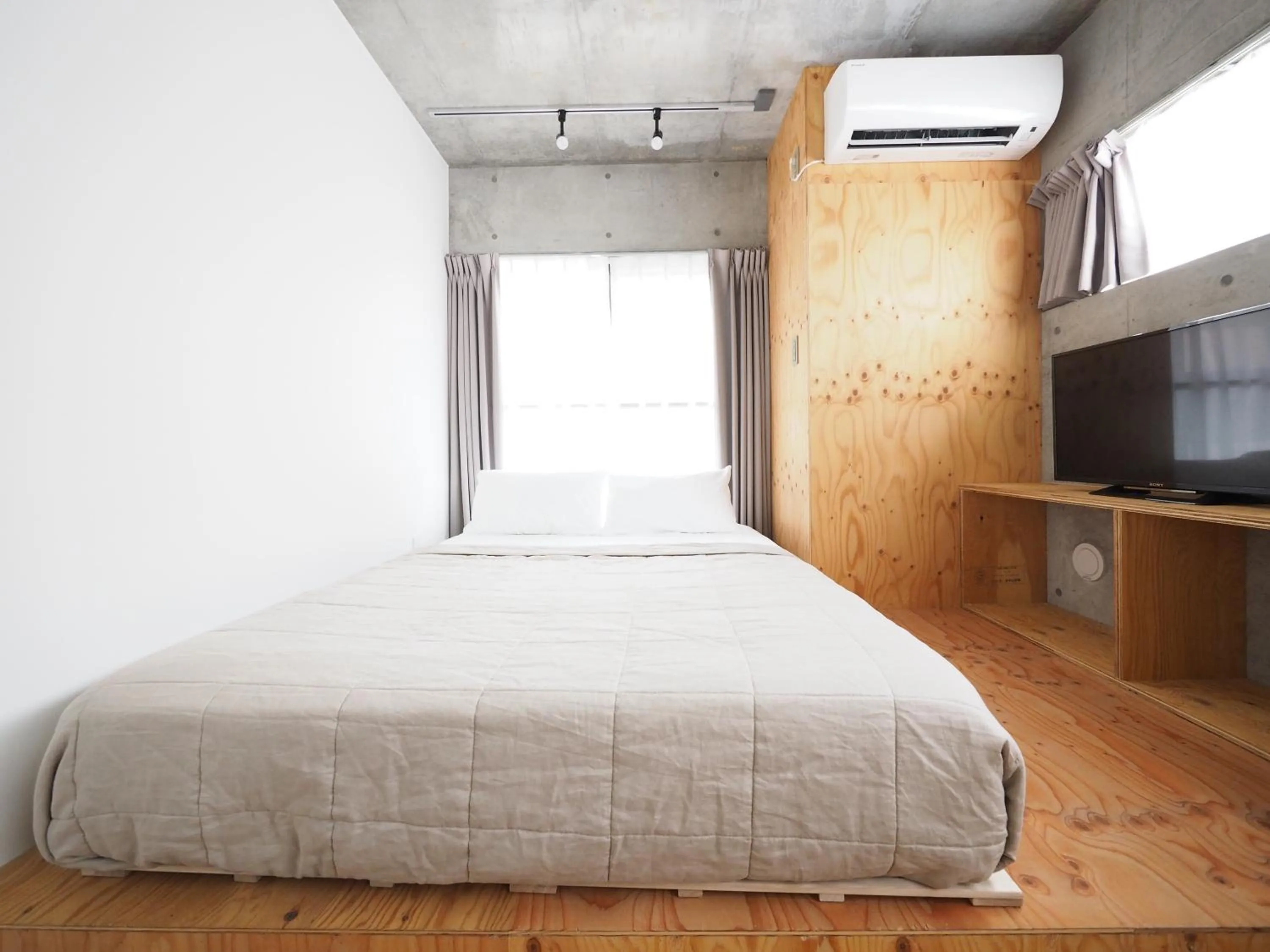 Bed in Smi:re Stay Oshiage