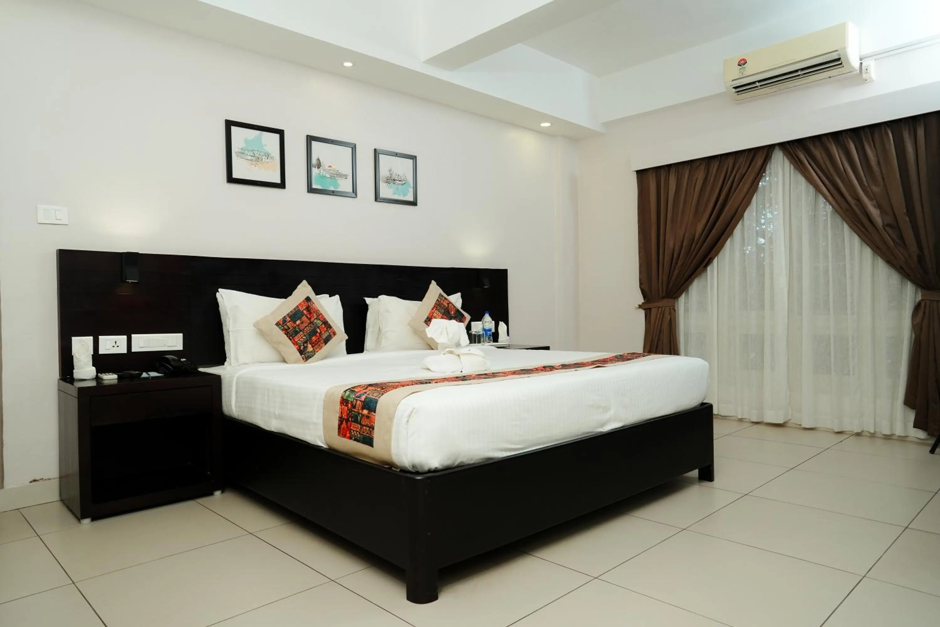 Bed in D Fort Hotel Kollam