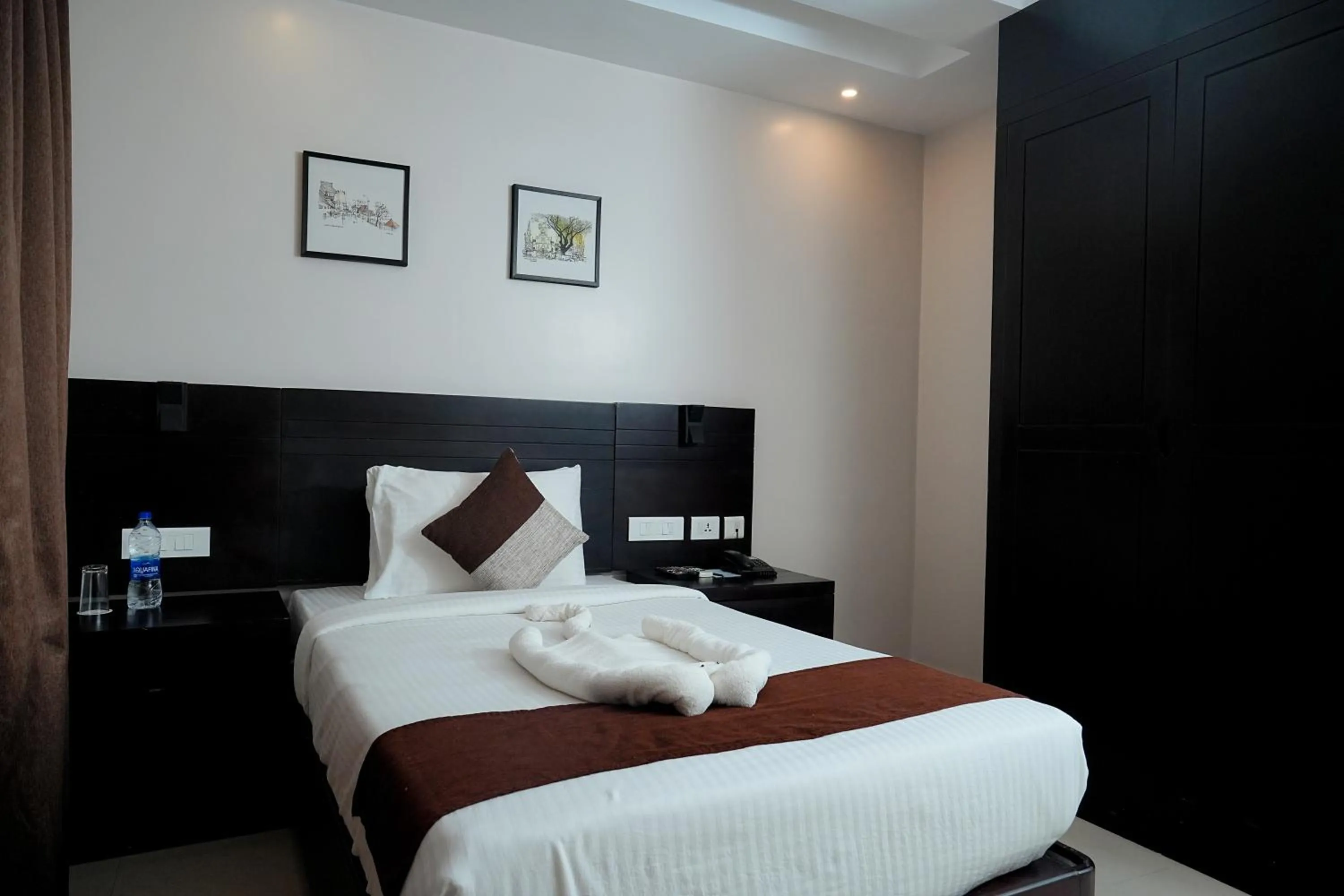 Bed in D Fort Hotel Kollam