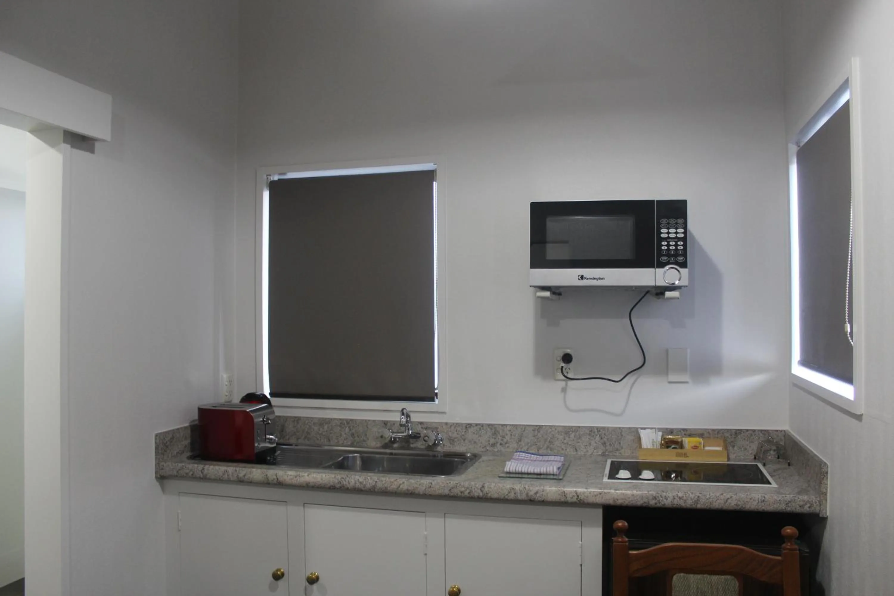 Kitchen or kitchenette in The Lofts Apartments