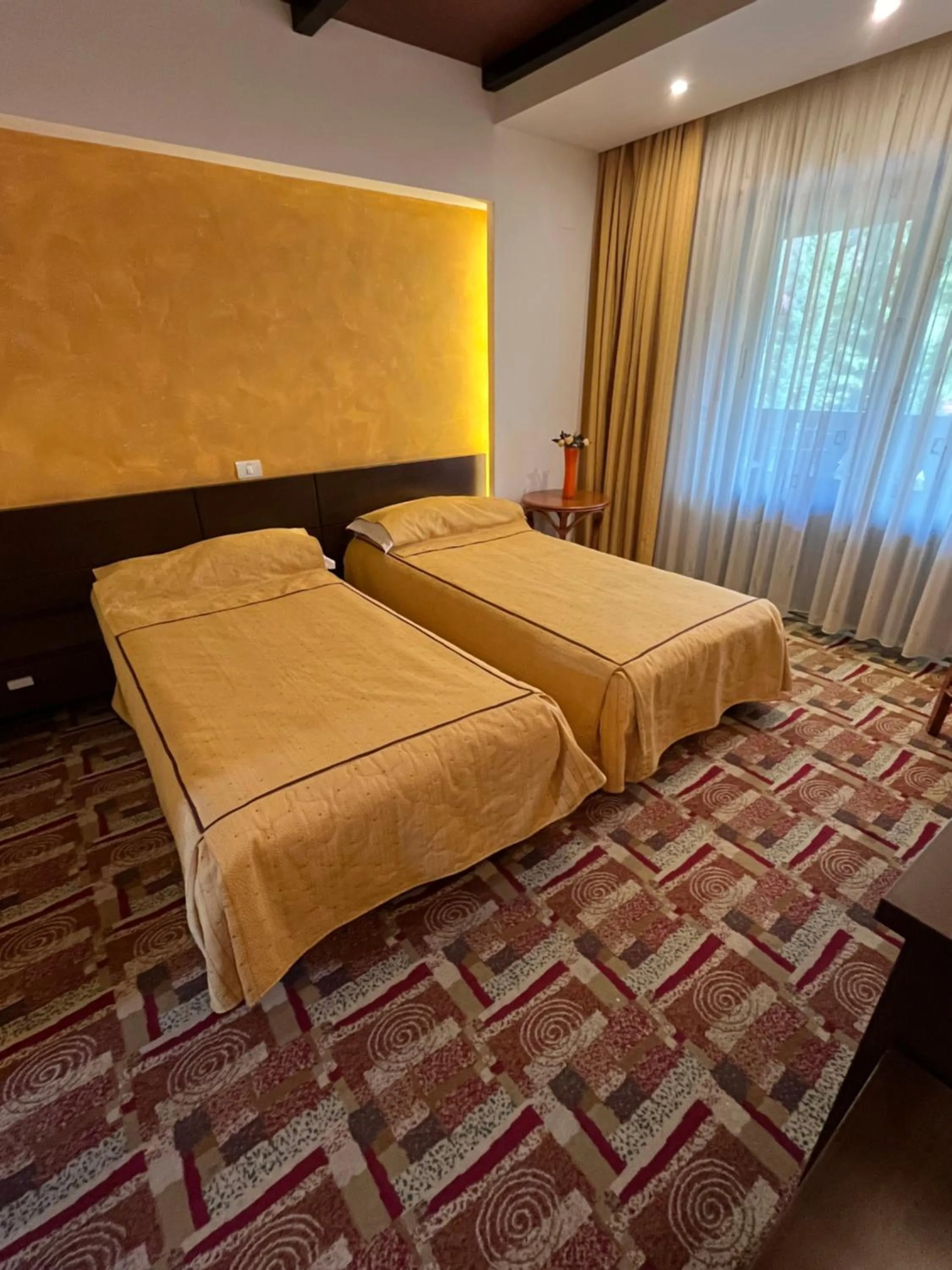 Bed in Casa Iris-Hotel & Restaurant