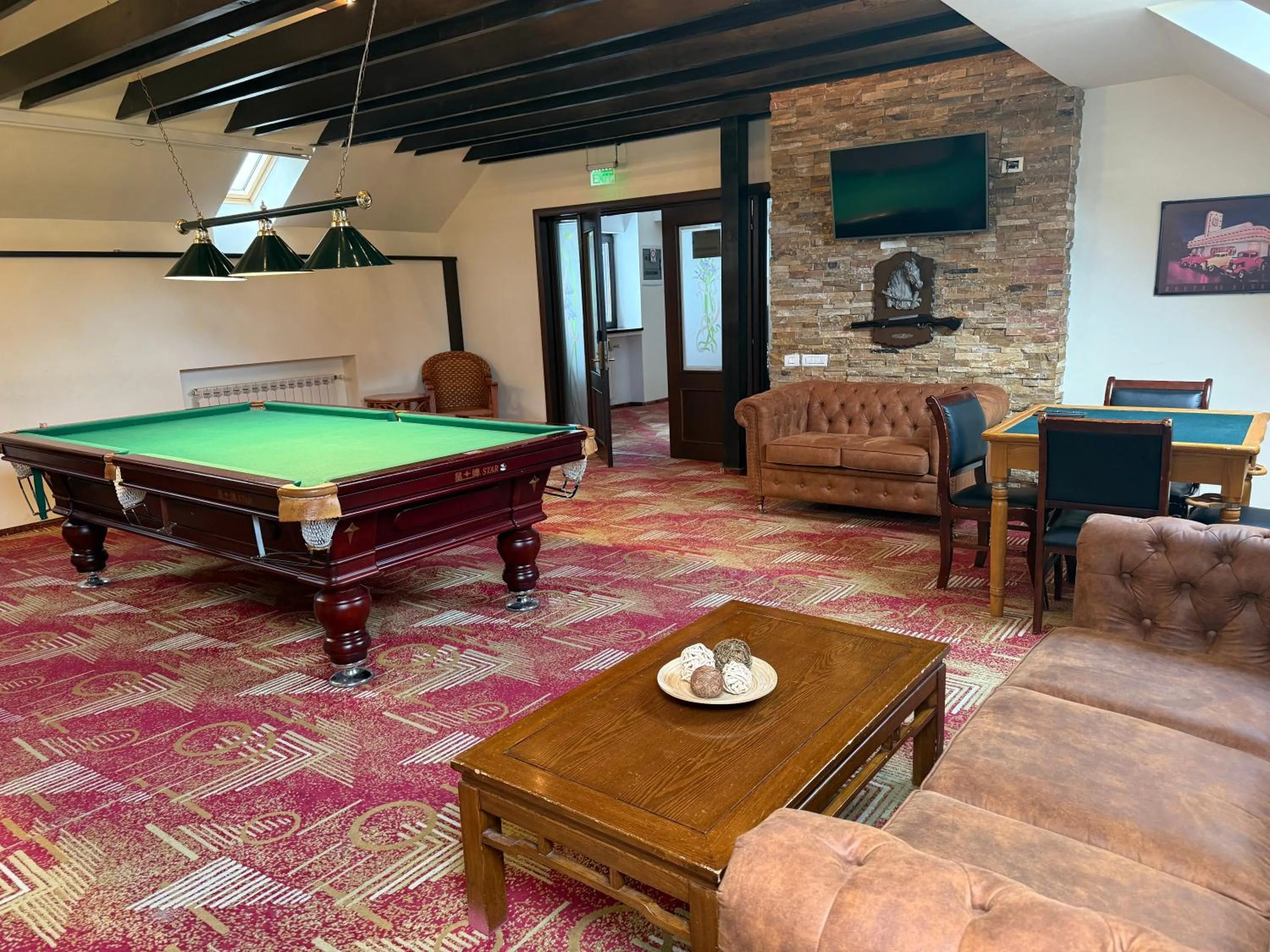 Communal lounge/ TV room in Casa Iris-Hotel & Restaurant