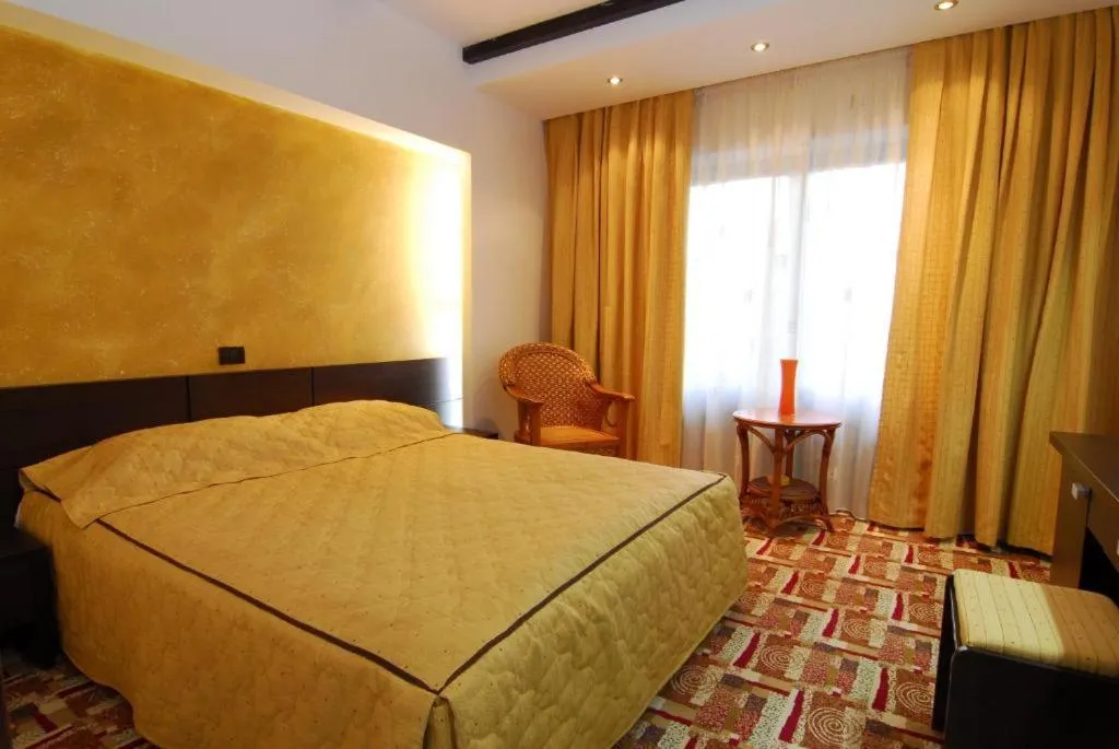 Bed in Casa Iris-Hotel & Restaurant