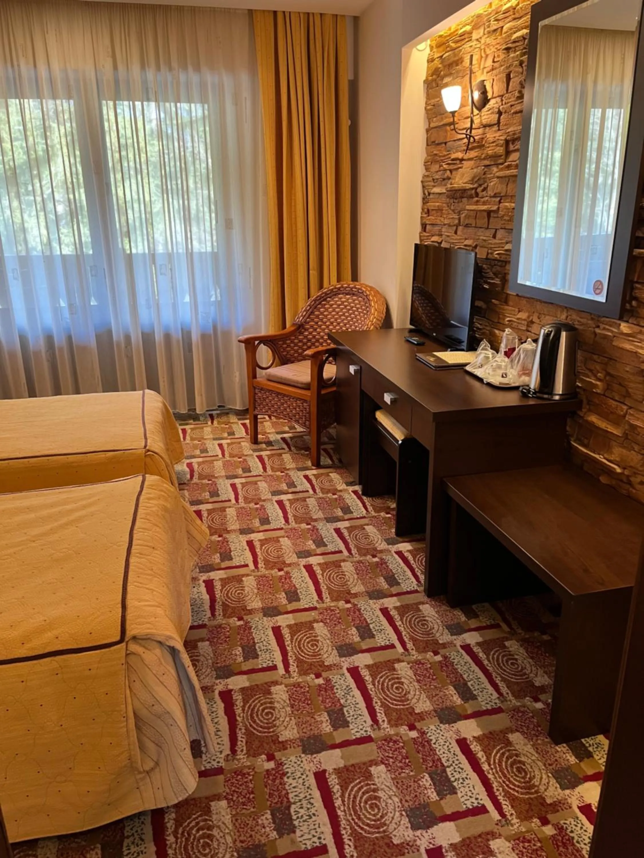 Bed in Casa Iris-Hotel & Restaurant