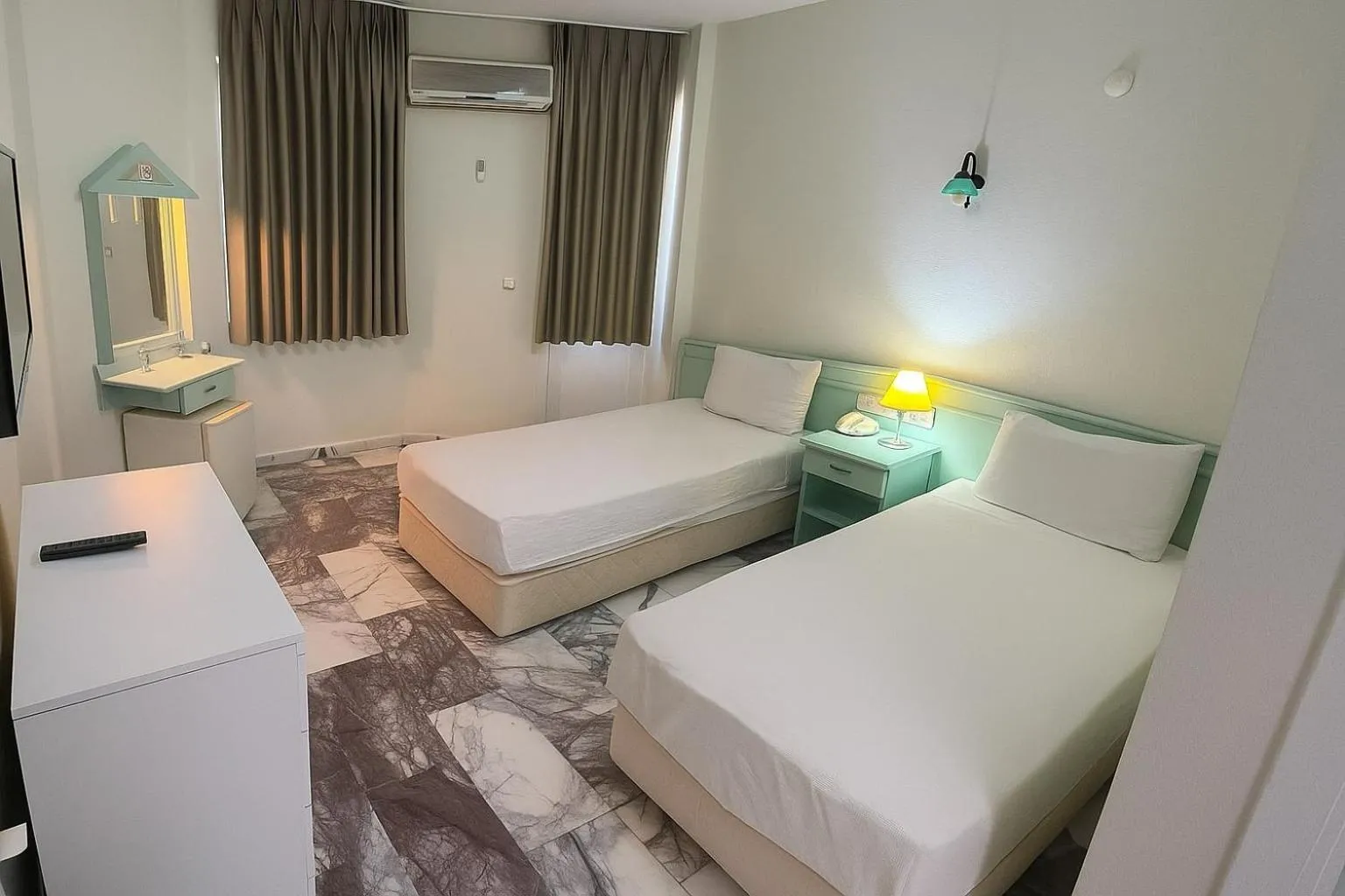 Bed in Mandalinn Hotel