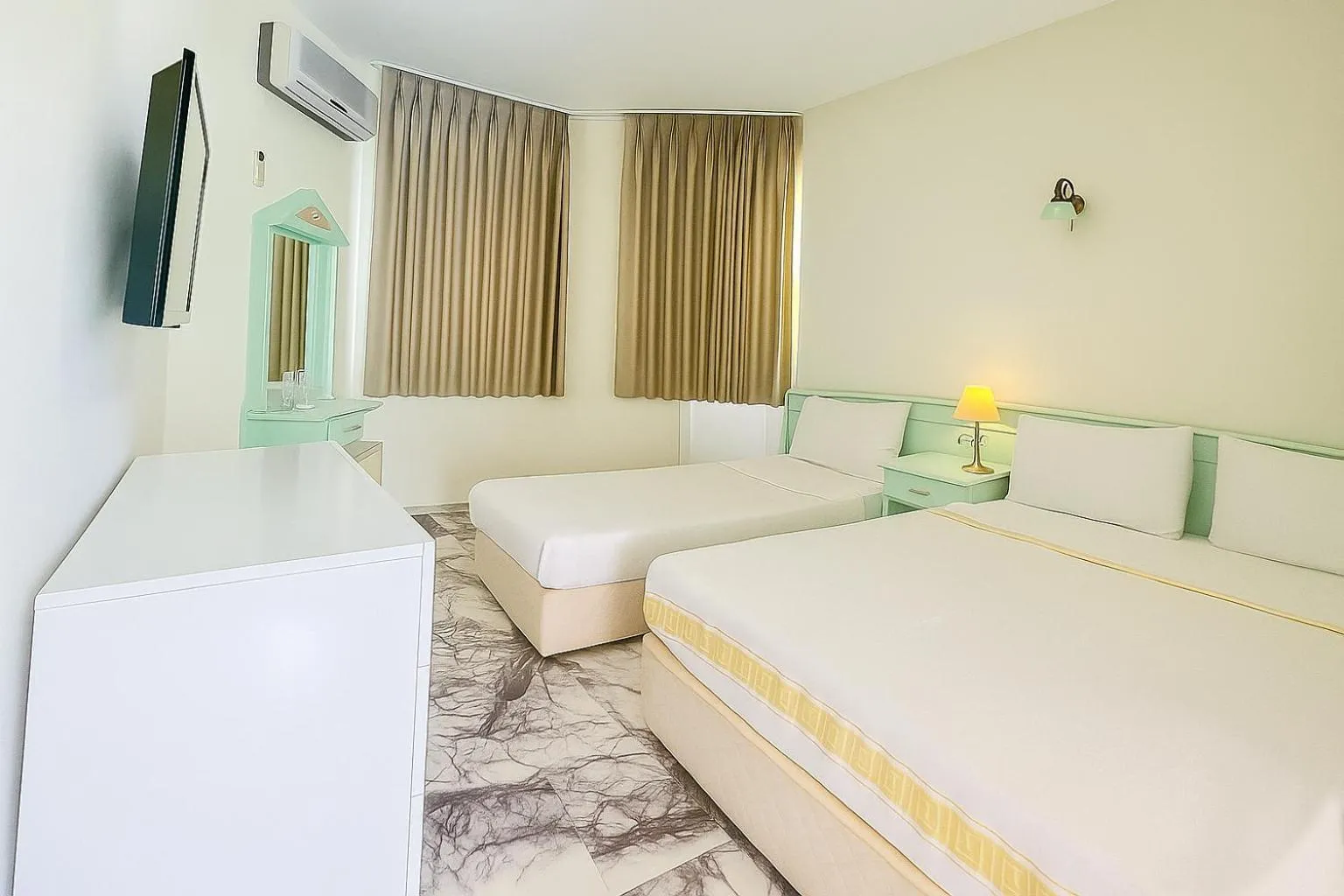 Bed in Mandalinn Hotel