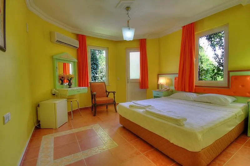 Bedroom in Mandalinn Hotel