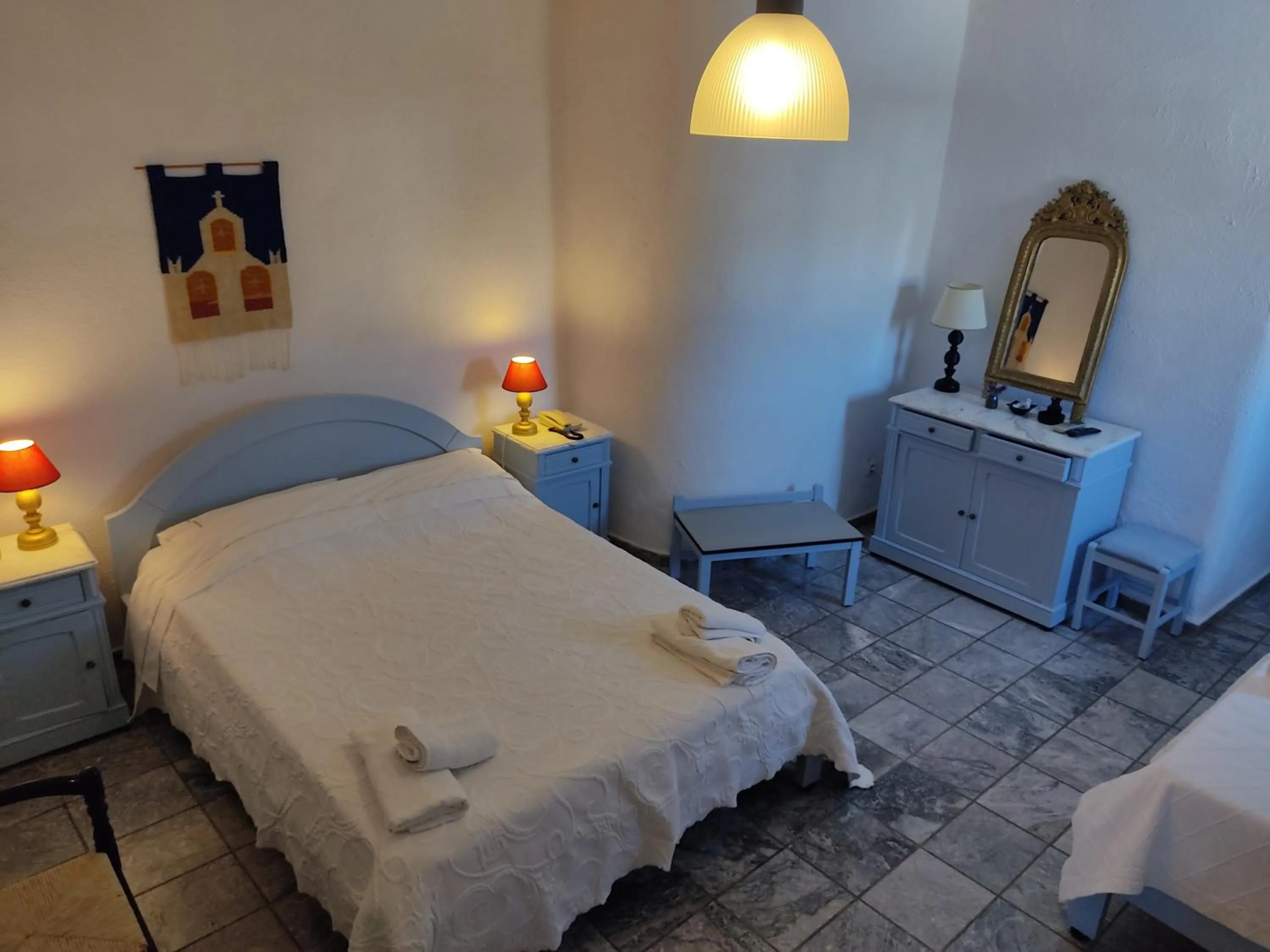 Bed in Porto Sikinos Hotel