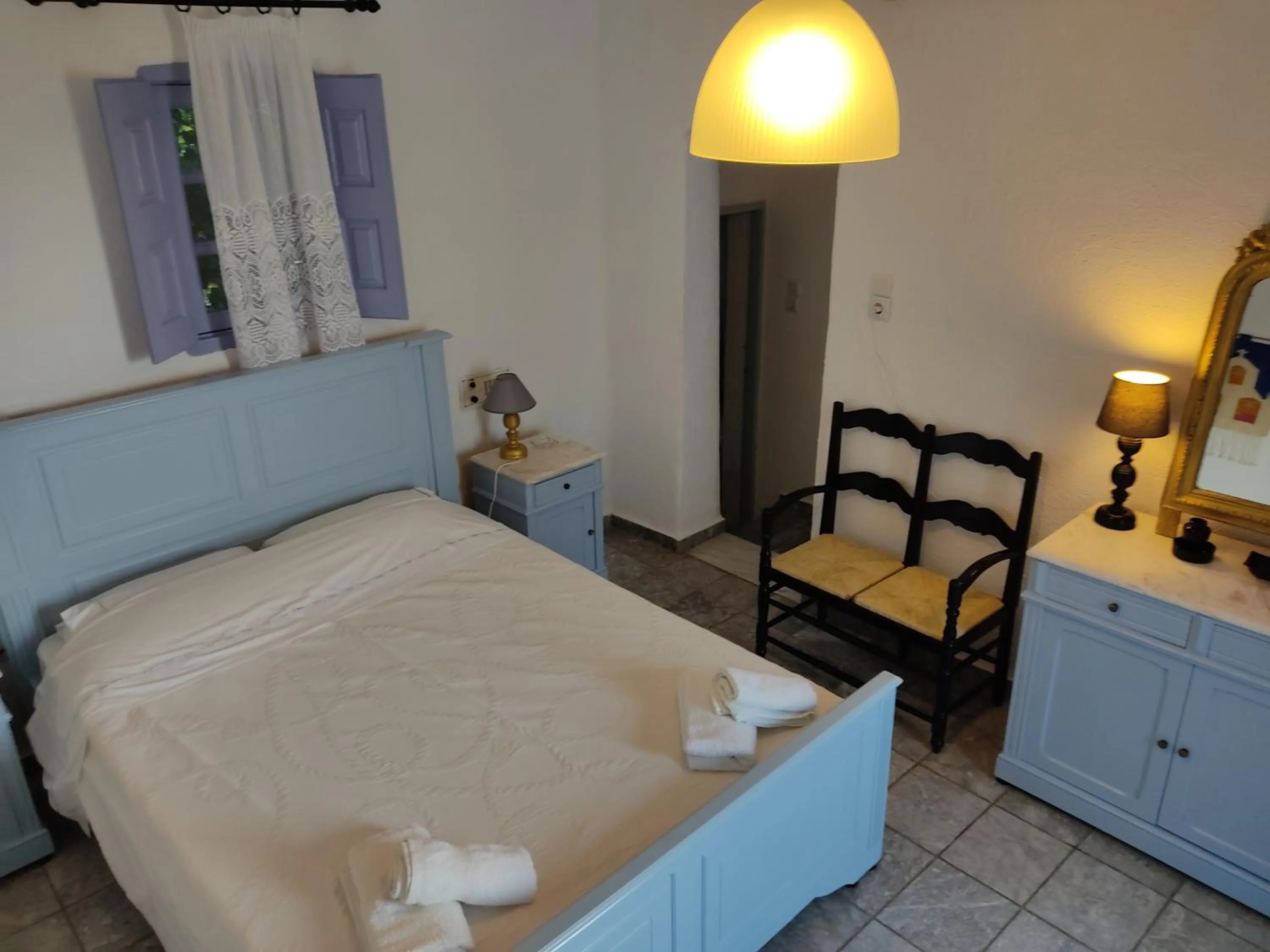 Bed in Porto Sikinos Hotel