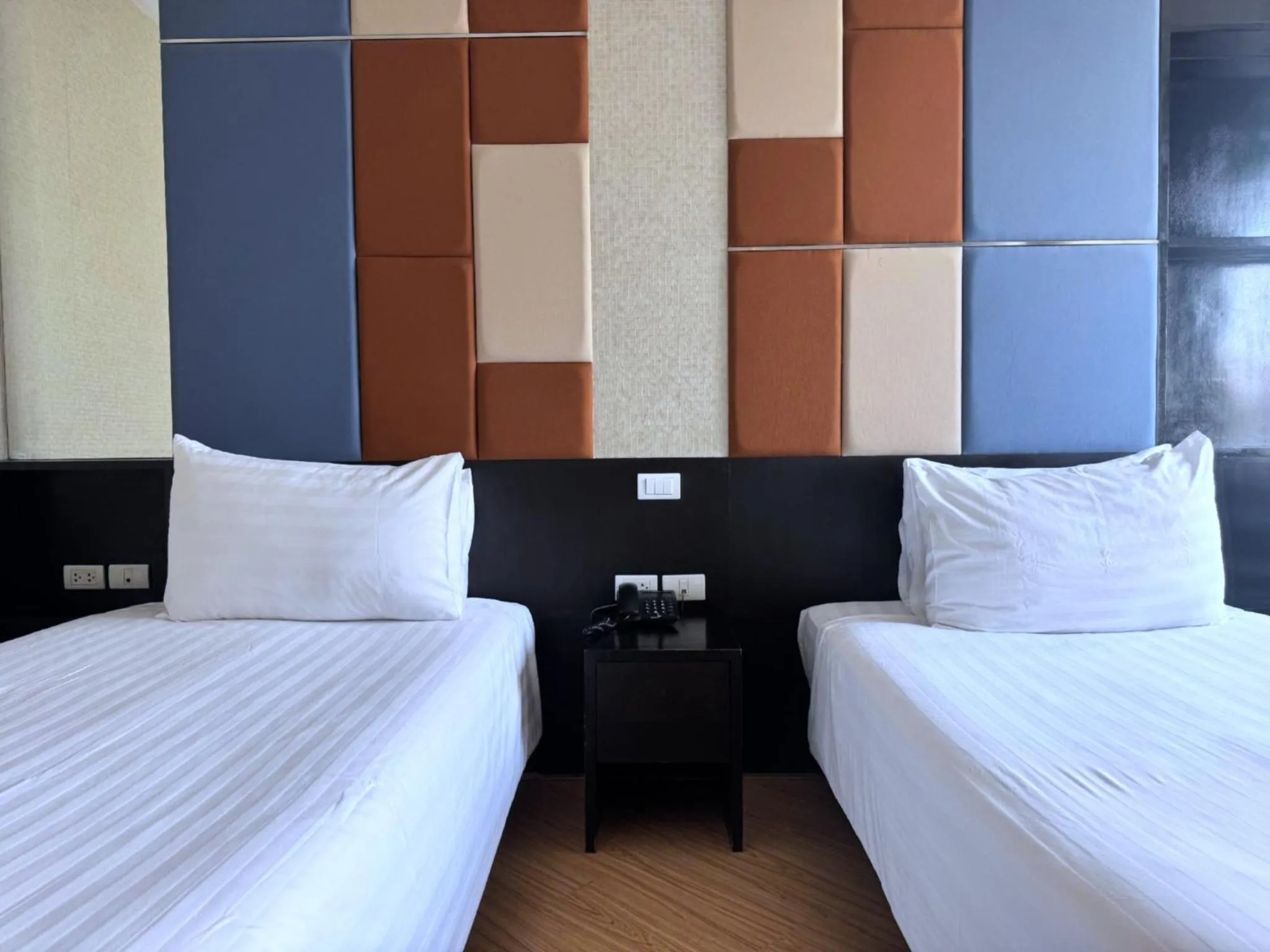 Bed in The Sunreno Hotel Bangkok