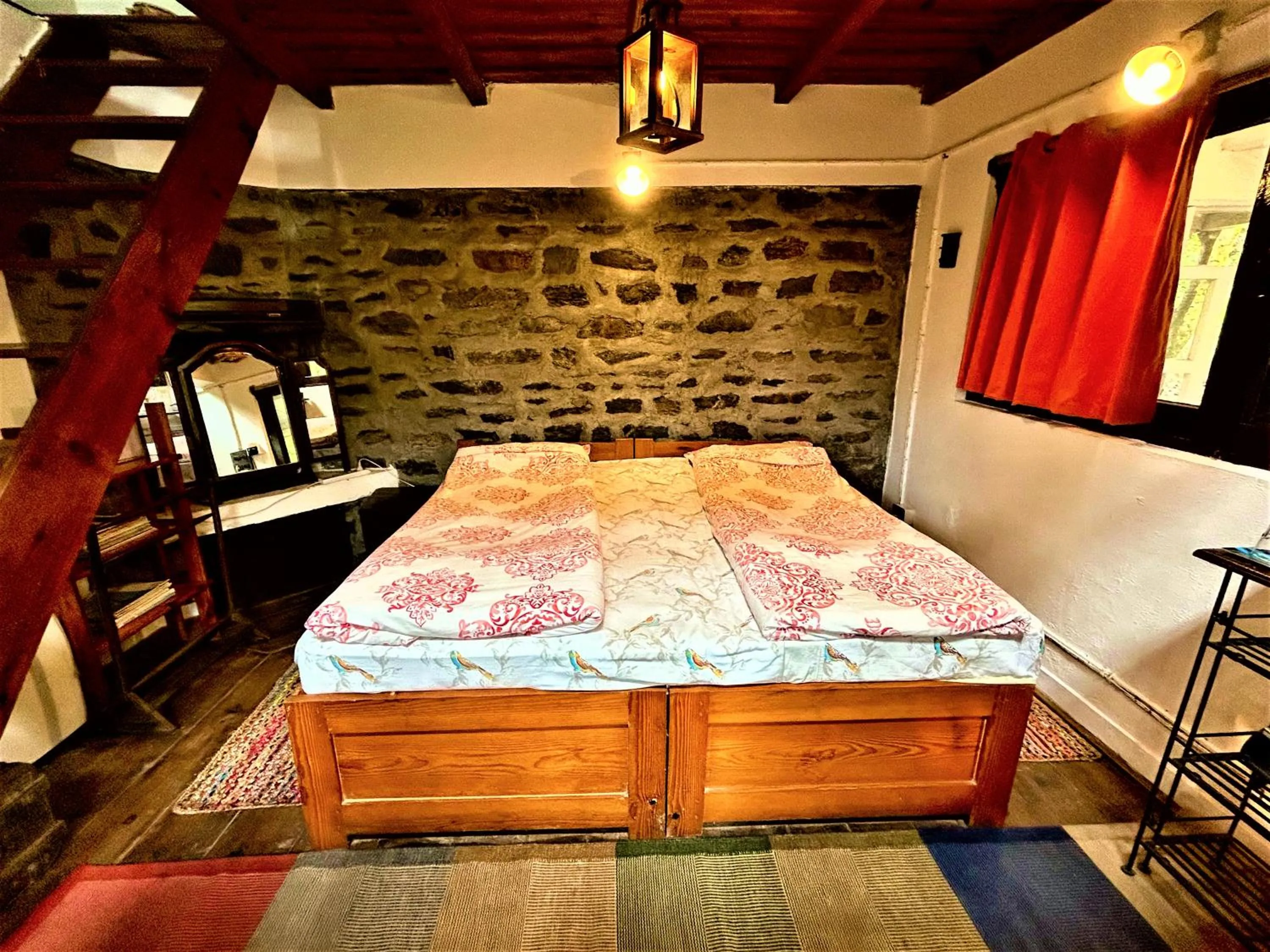 Bed in Jungle Lore Birding Lodge