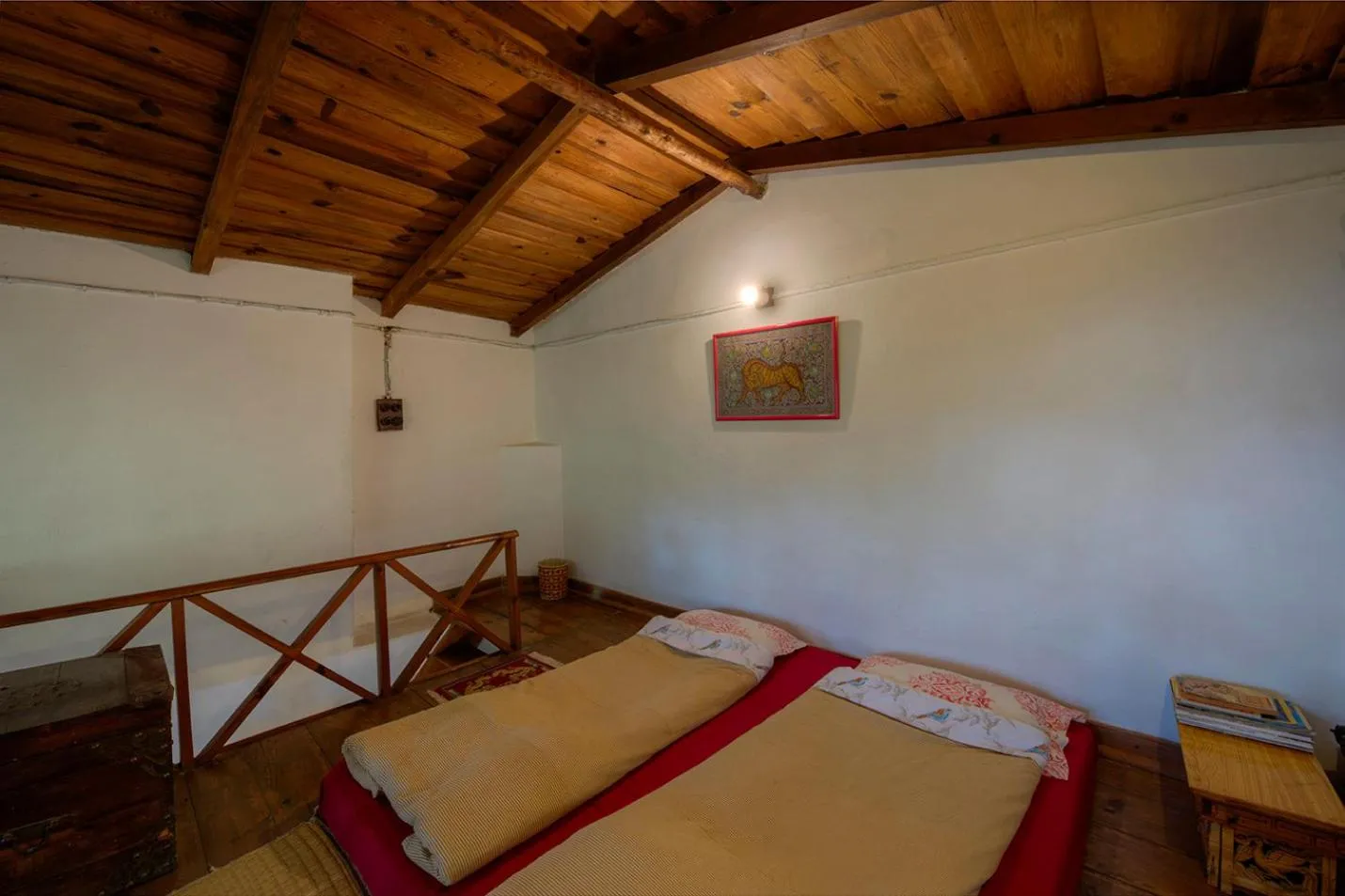 Bed in Jungle Lore Birding Lodge