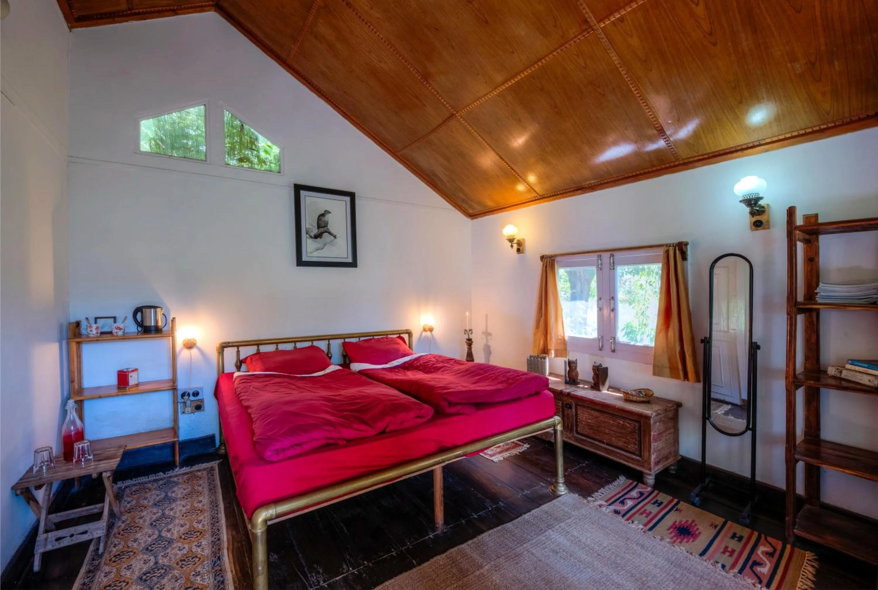 Bed in Jungle Lore Birding Lodge