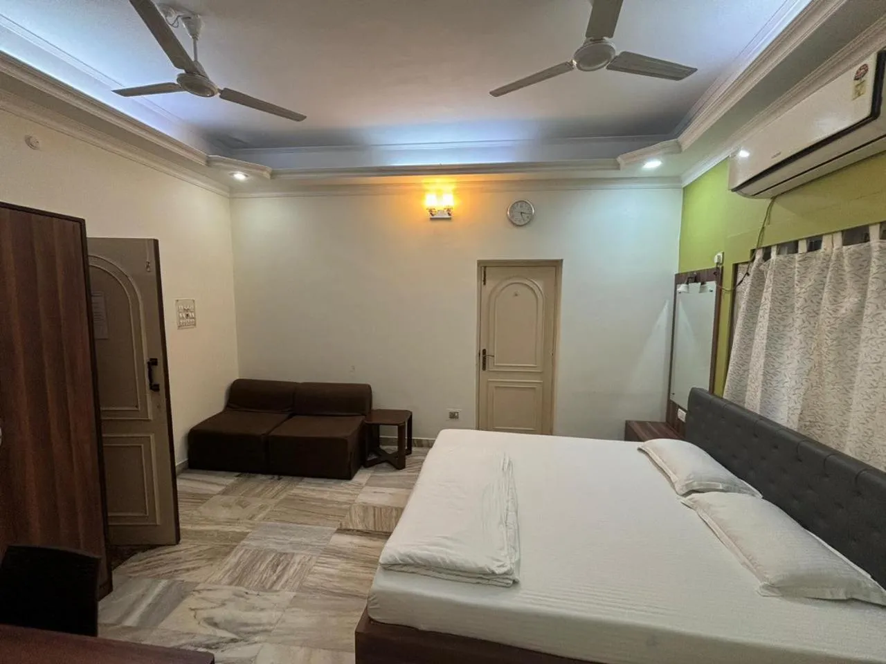 Bed in Om Sai Villa Guesthouse