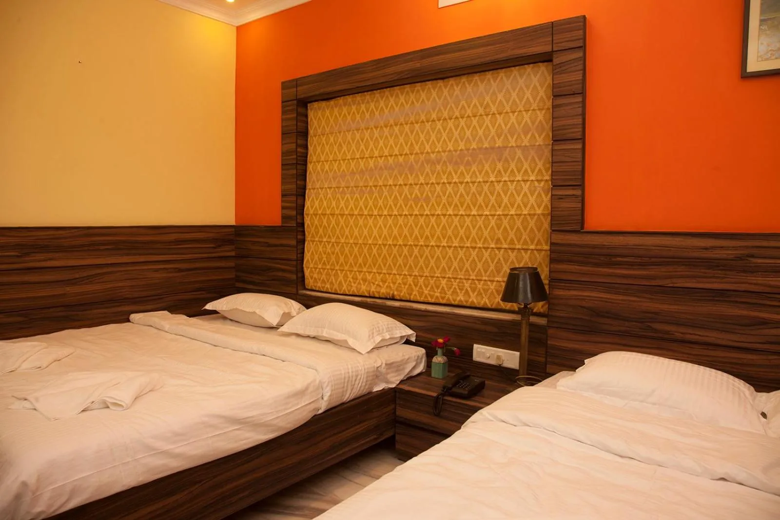 Bed in Om Sai Villa Guesthouse