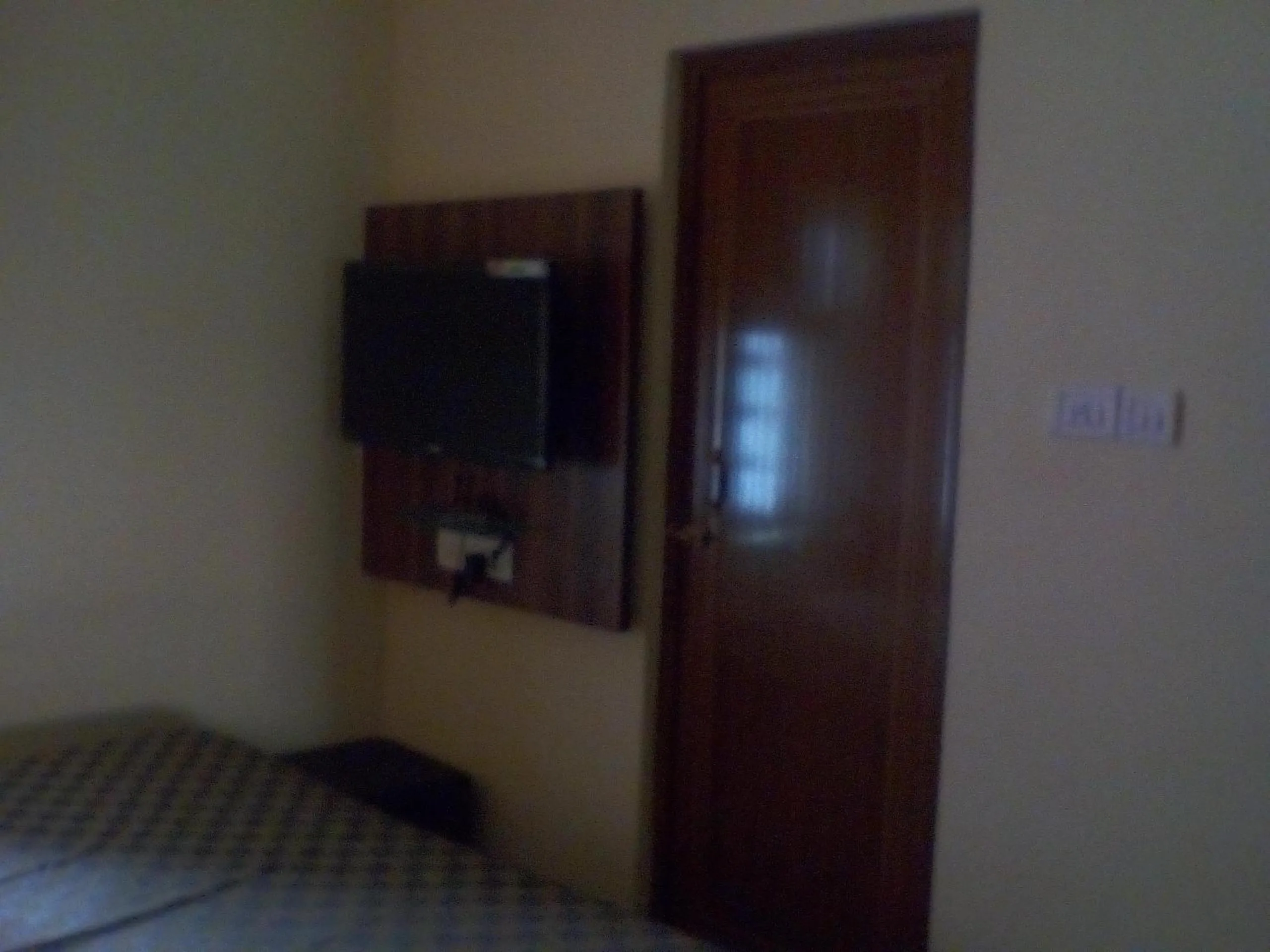 Bed in Om Sai Villa Guesthouse