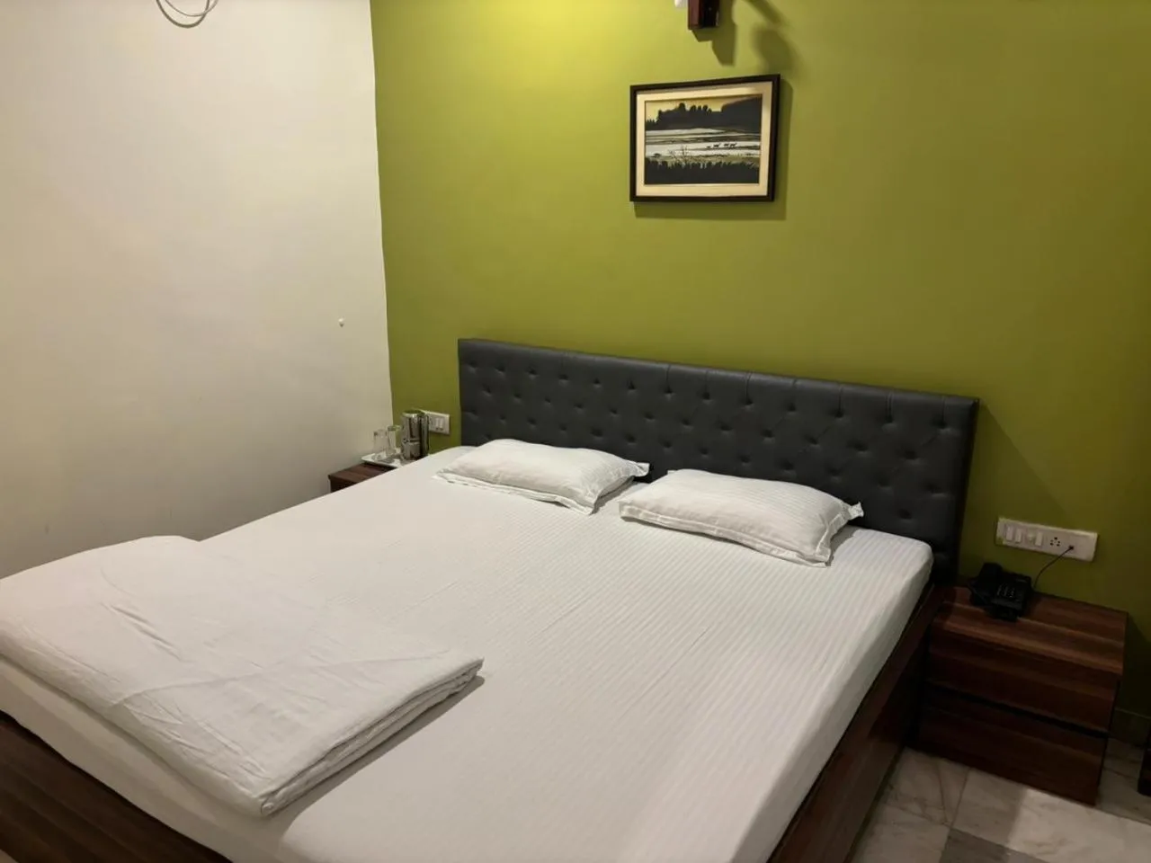 Bed in Om Sai Villa Guesthouse