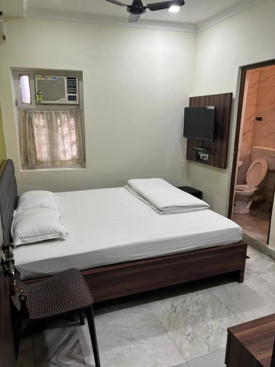 Bed in Om Sai Villa Guesthouse