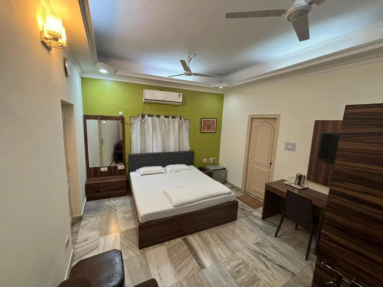 Bed in Om Sai Villa Guesthouse