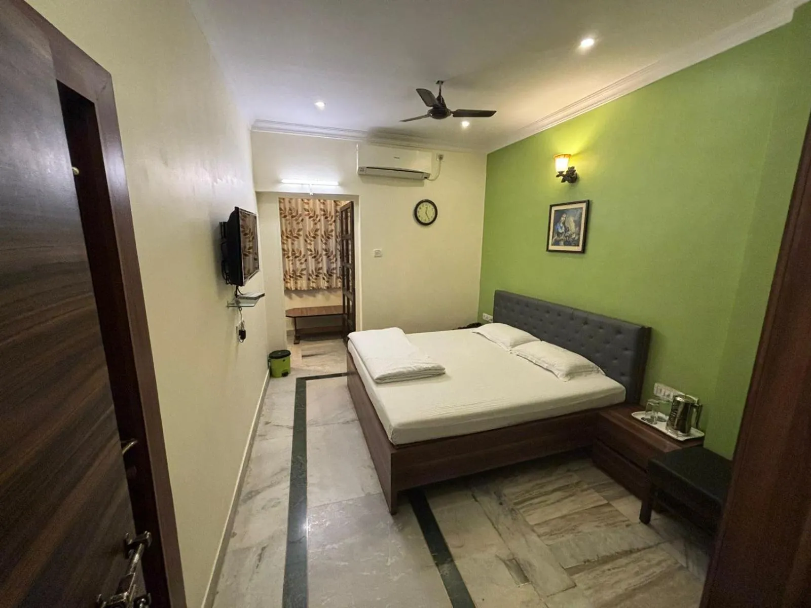 Bed in Om Sai Villa Guesthouse
