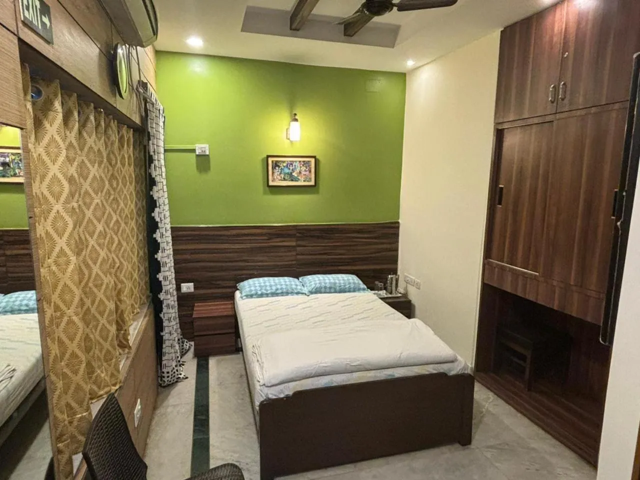 Bed in Om Sai Villa Guesthouse