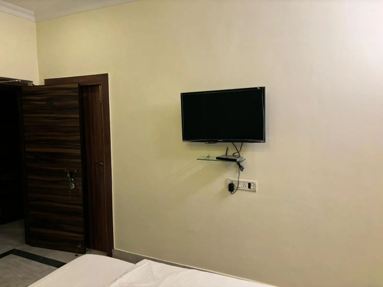 Bed in Om Sai Villa Guesthouse