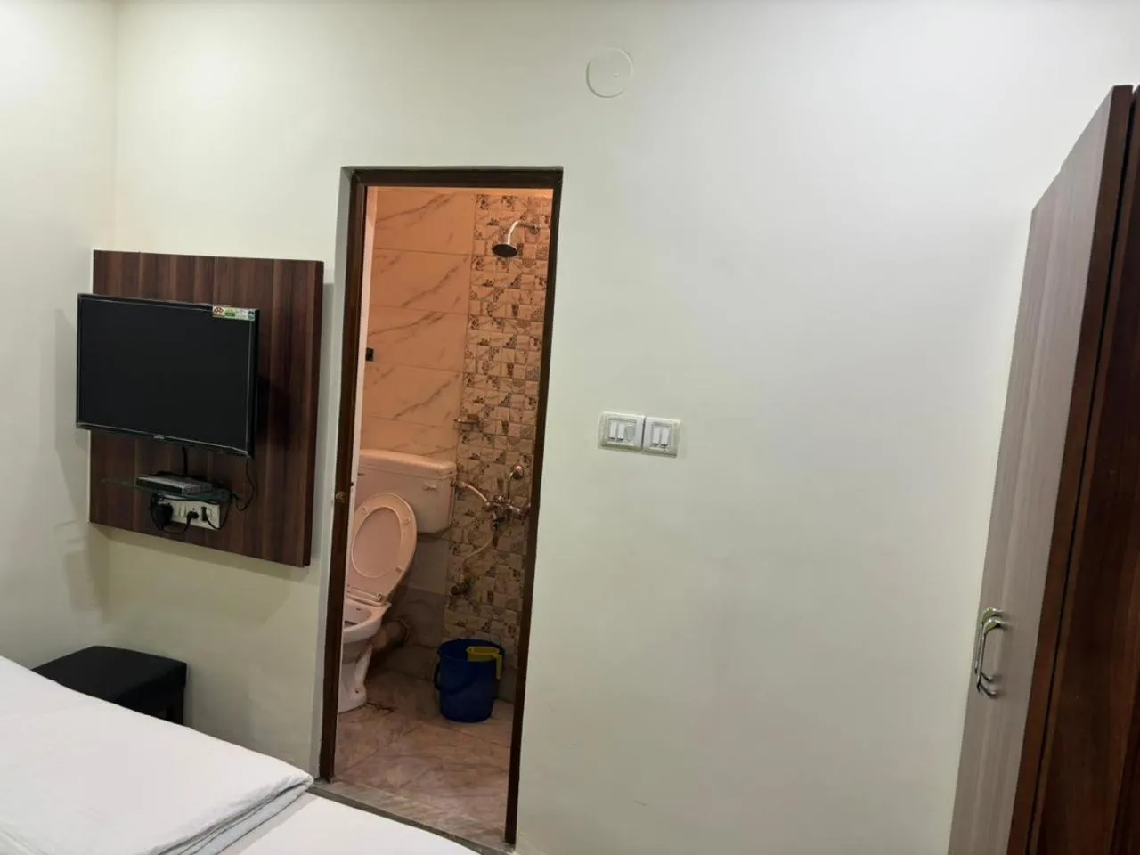 Bed in Om Sai Villa Guesthouse