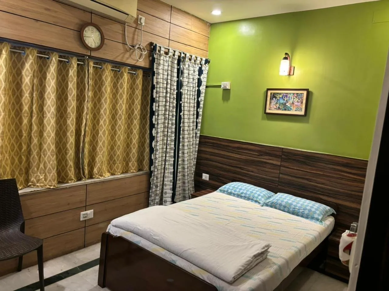 Bed in Om Sai Villa Guesthouse