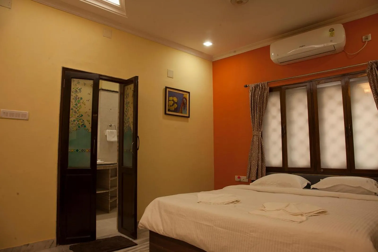 Bed in Om Sai Villa Guesthouse