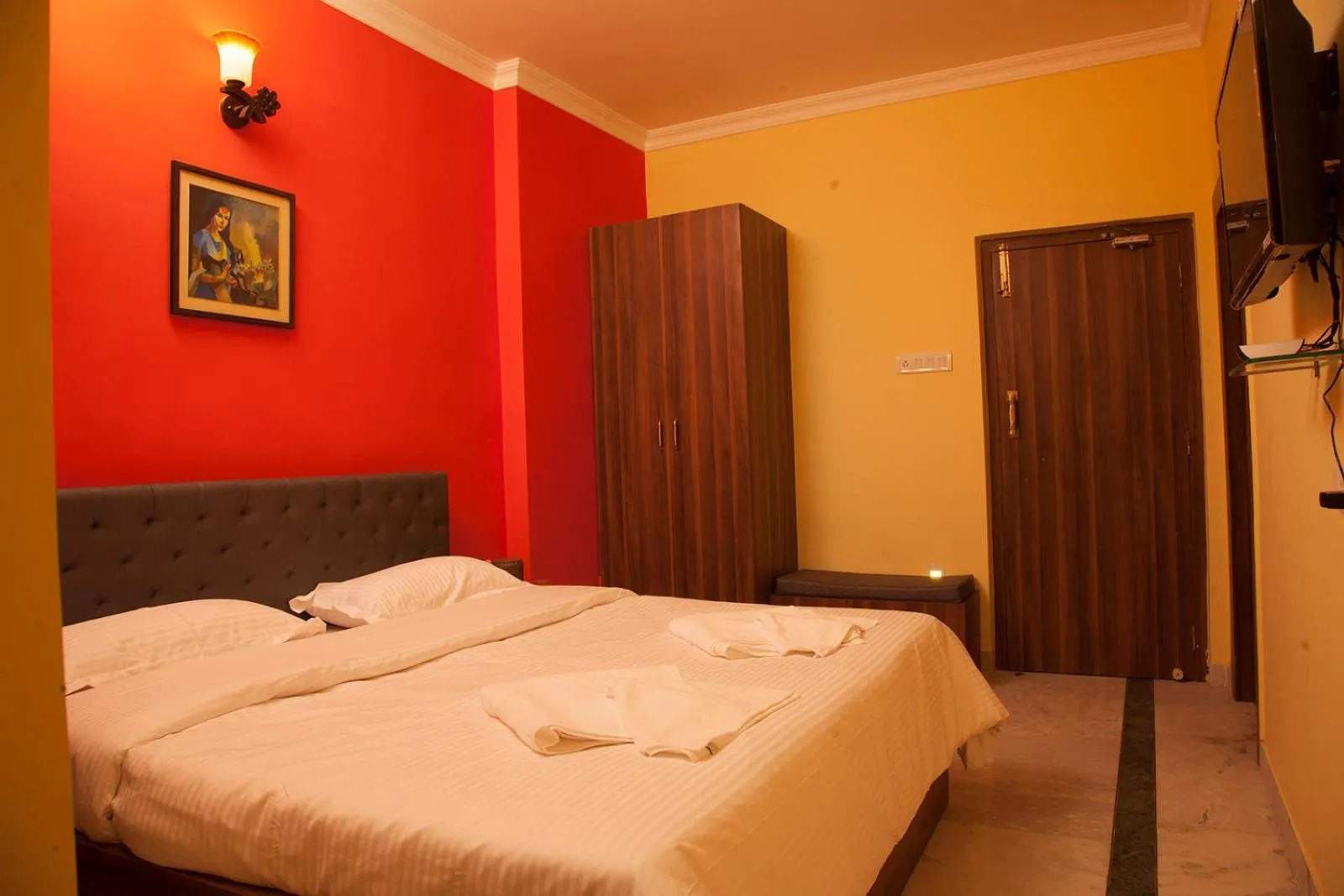 Bed in Om Sai Villa Guesthouse
