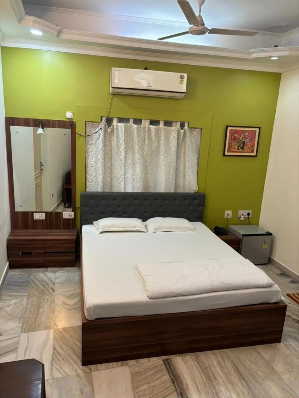 Bed in Om Sai Villa Guesthouse
