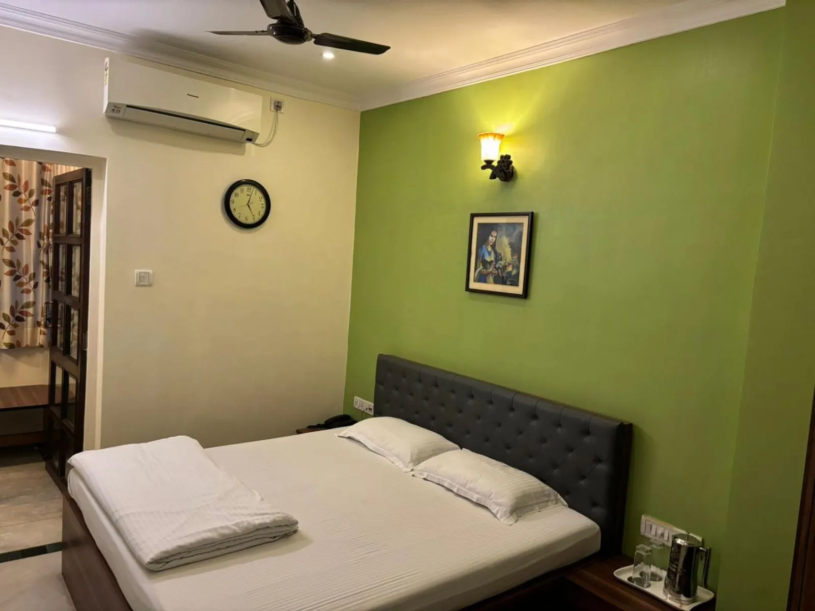 Bed in Om Sai Villa Guesthouse