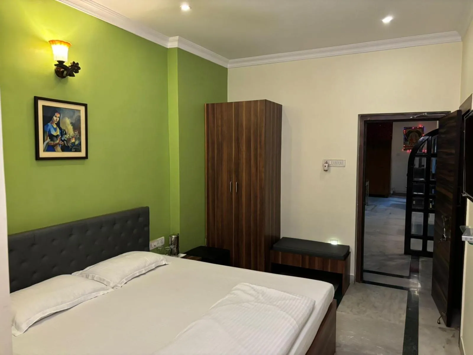 Bed in Om Sai Villa Guesthouse