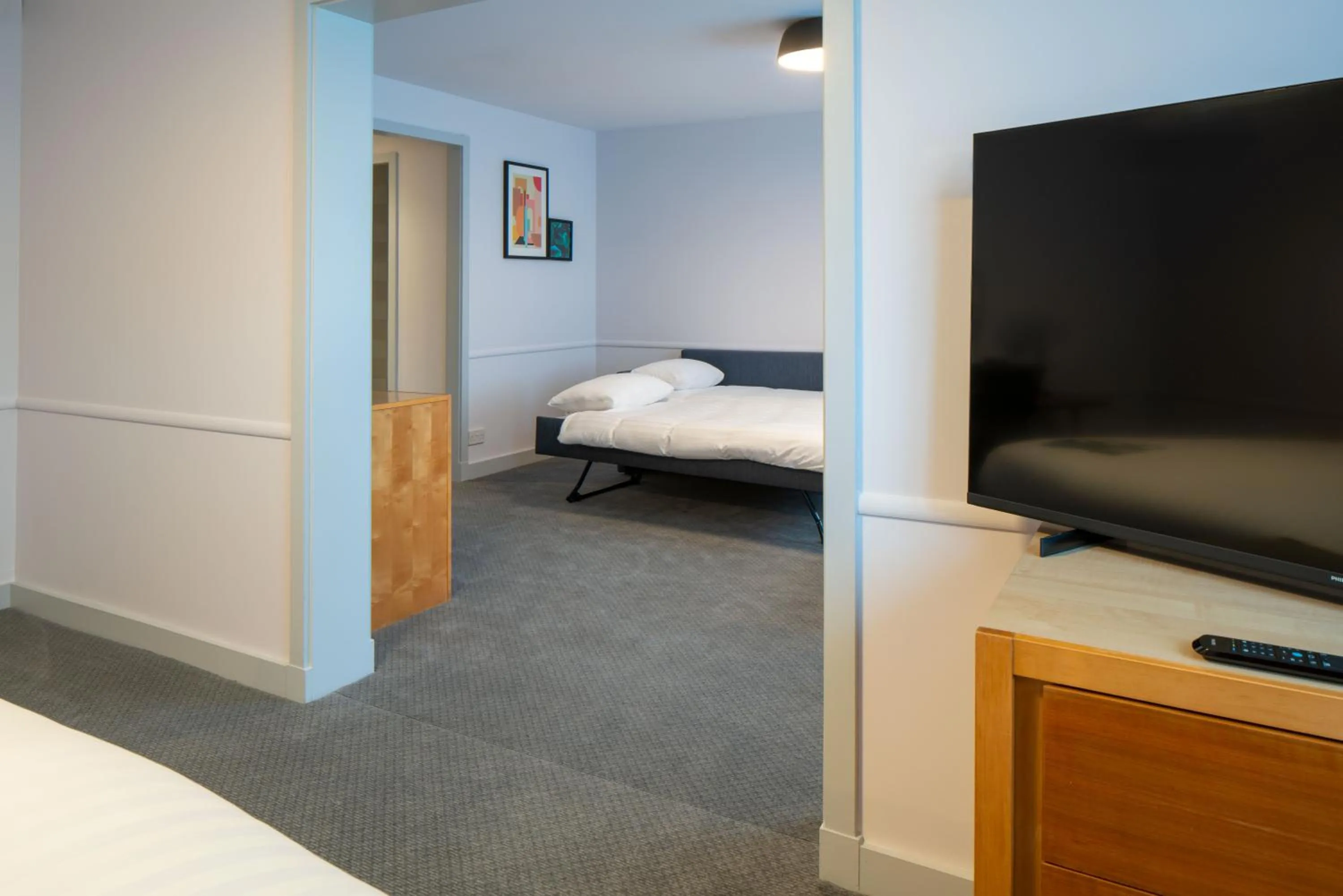 Communal lounge/ TV room, Bed in Holiday Inn Bristol Filton by IHG