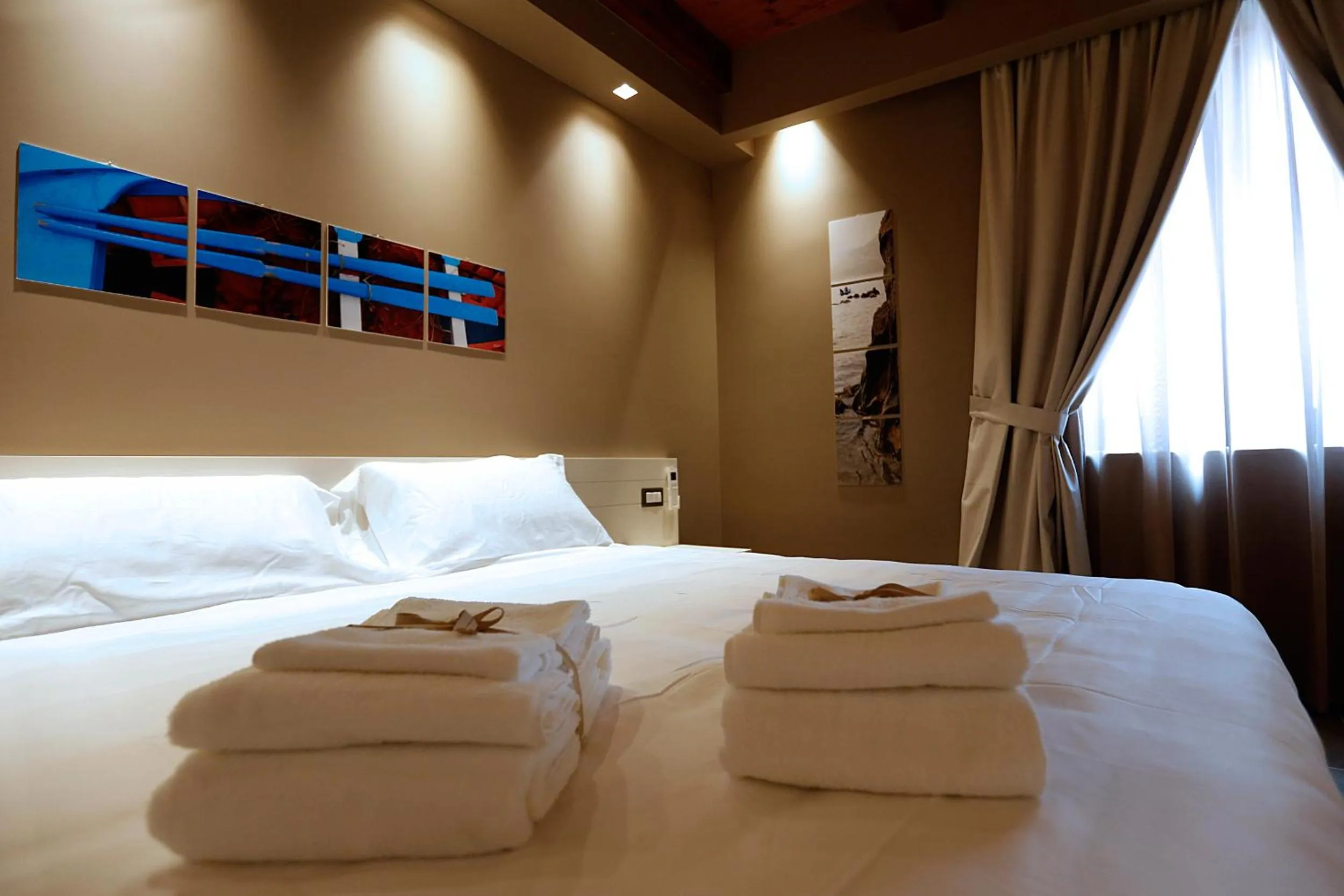 Bed in Il Casato Deluxe Rooms