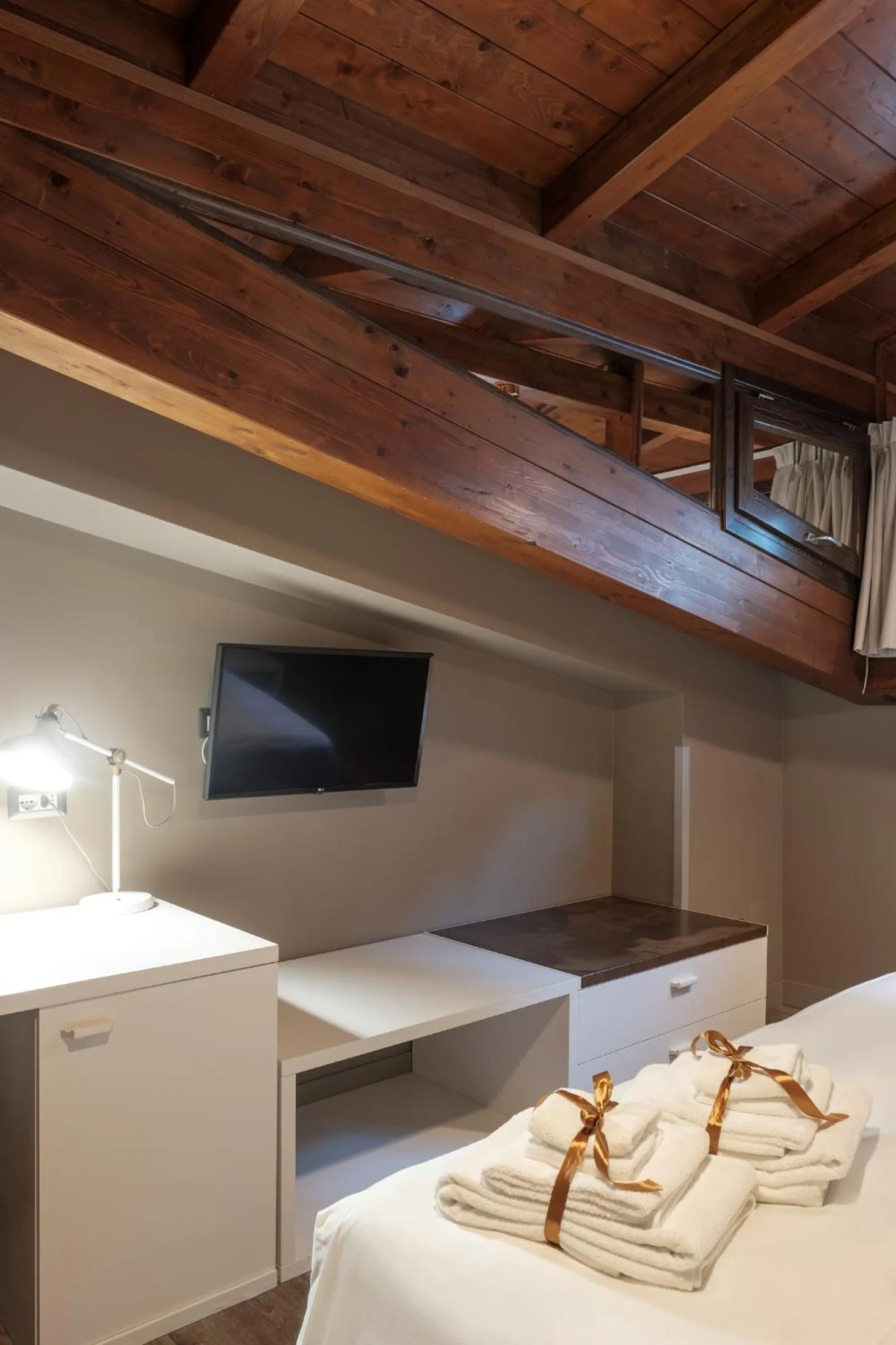 Bed in Il Casato Deluxe Rooms